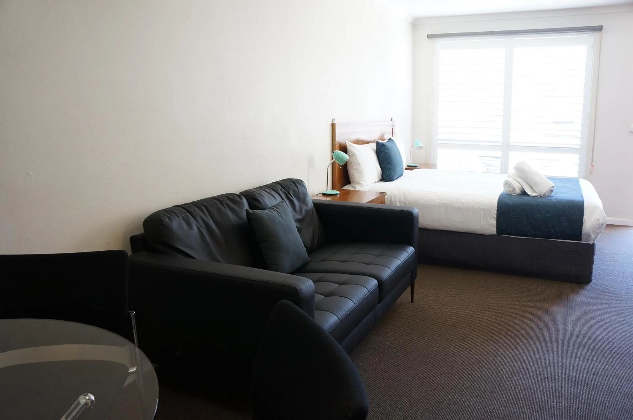 Bed in Waves Motel and Apartments