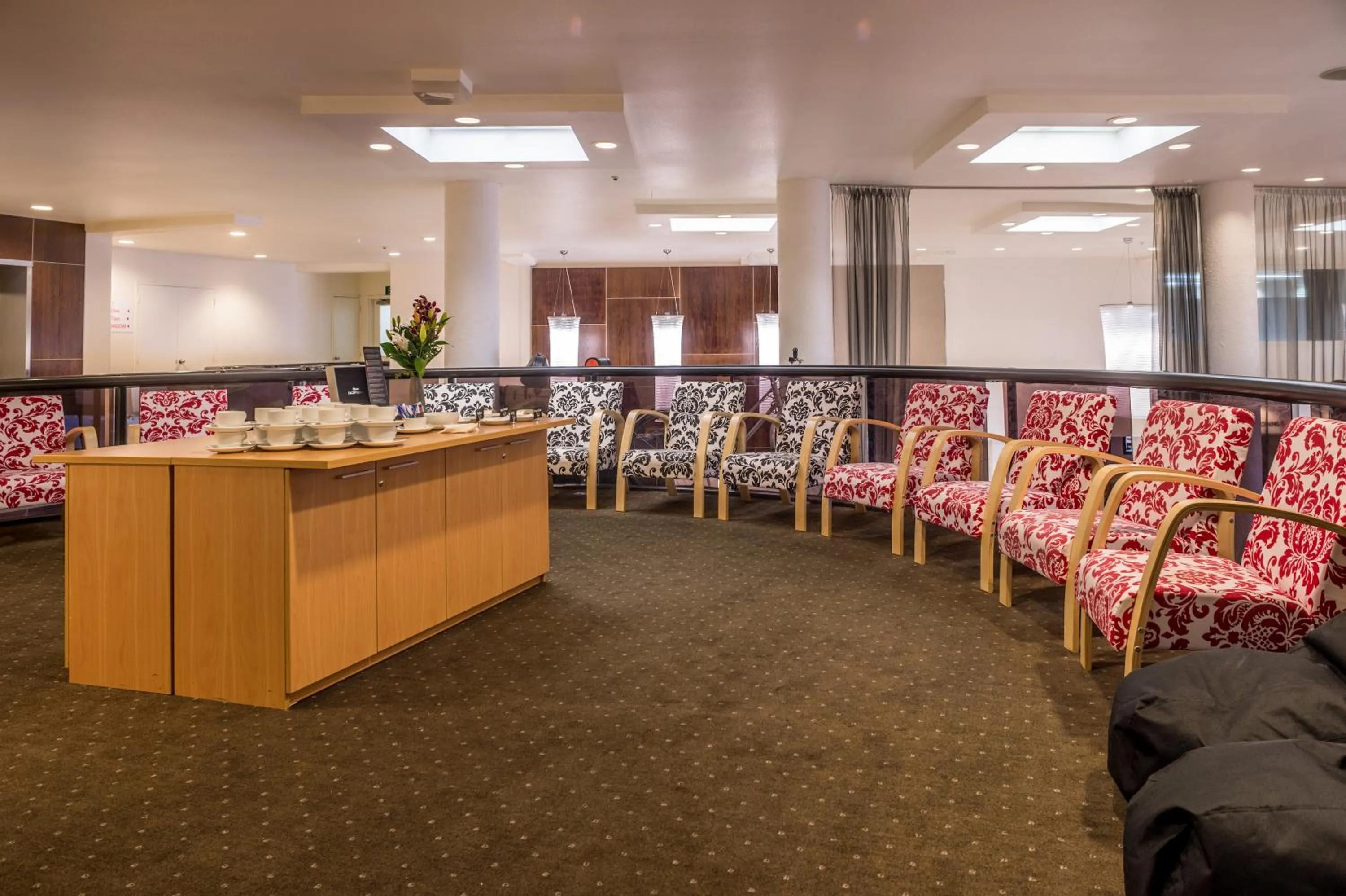 Communal lounge/ TV room in West Plaza Hotel