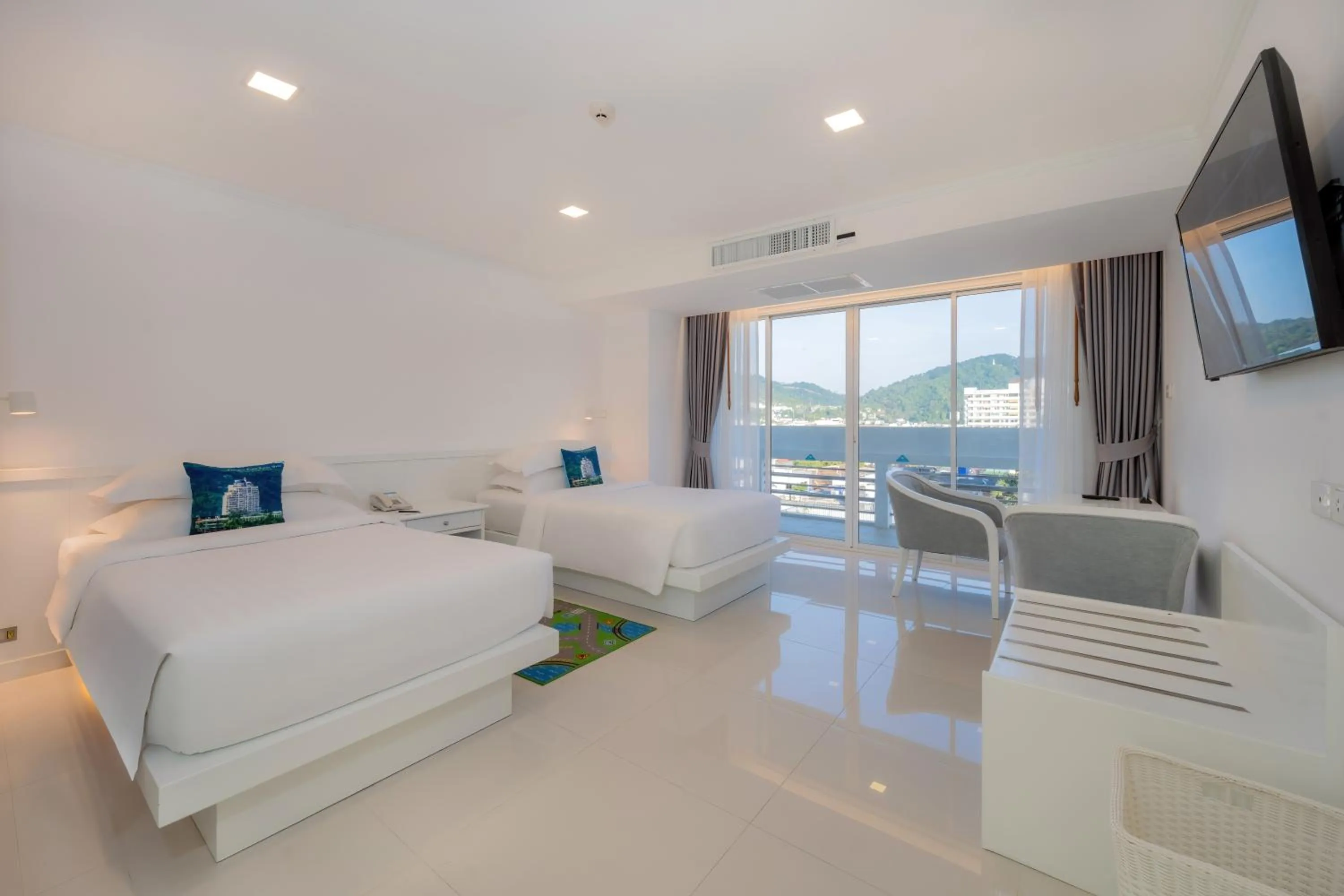 Bedroom, Bed in Andaman Beach Suites Hotel, Patong Phuket