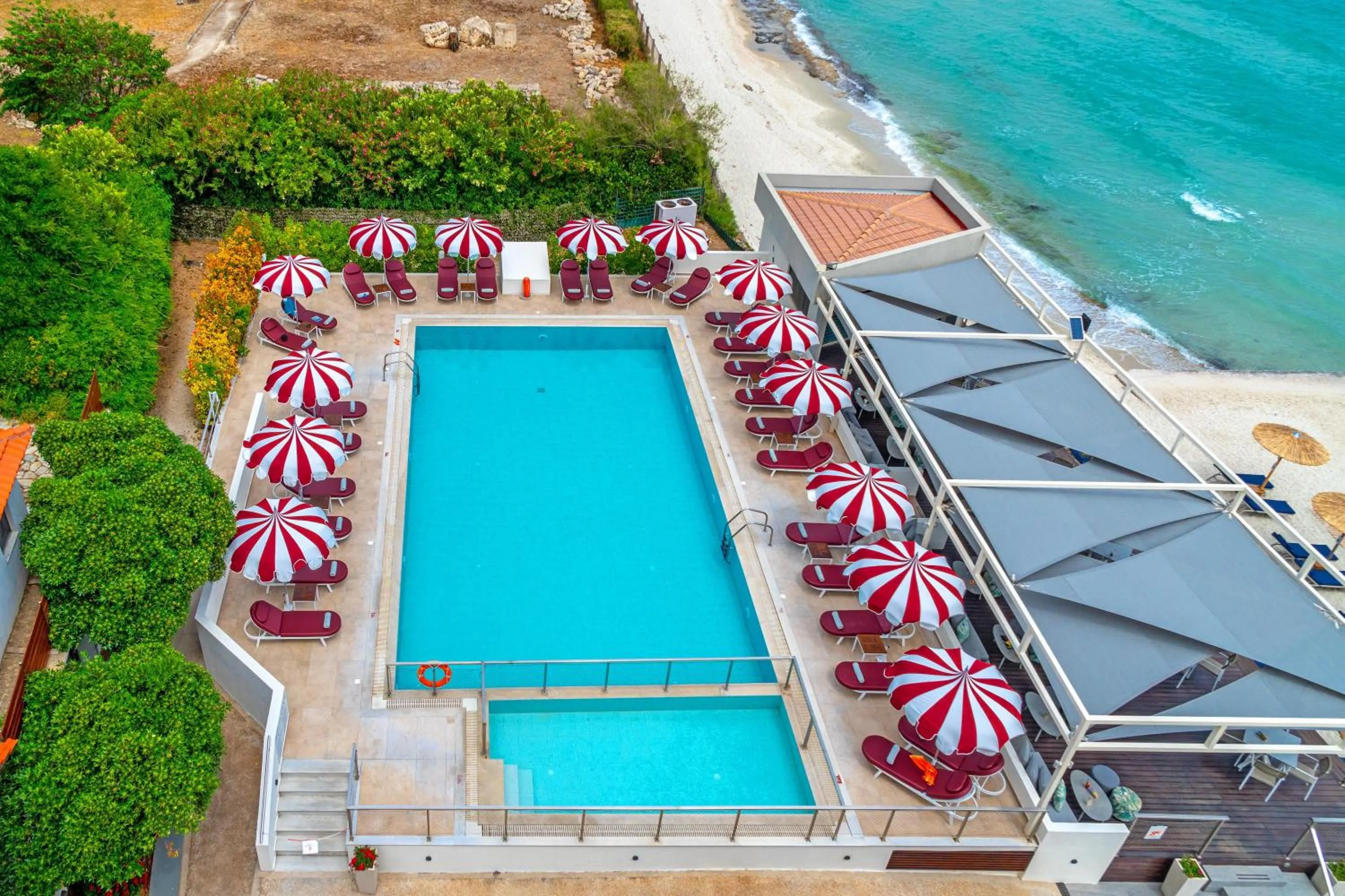 Swimming pool in Ammon Zeus Luxury Beach Hotel