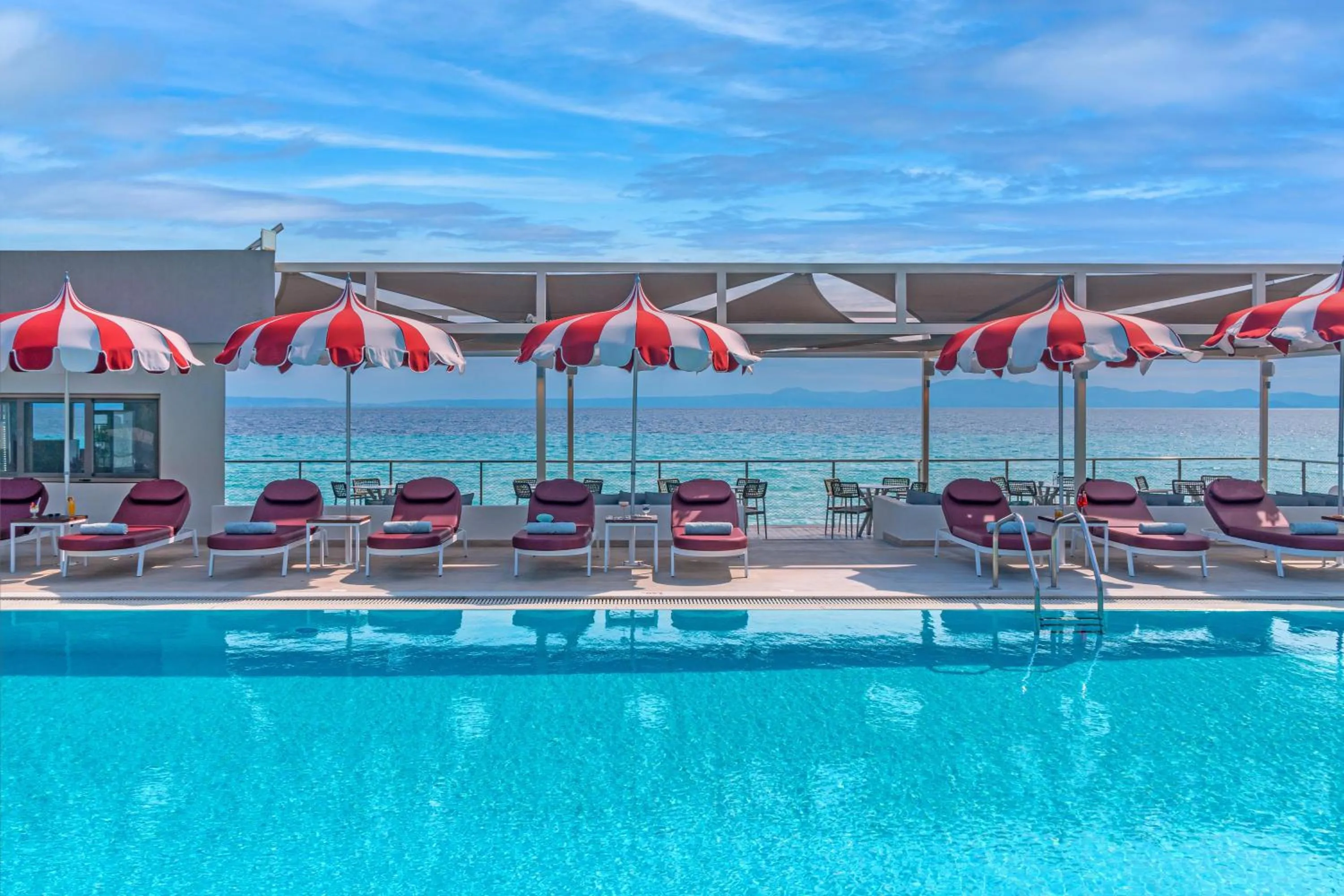 Swimming pool in Ammon Zeus Luxury Beach Hotel