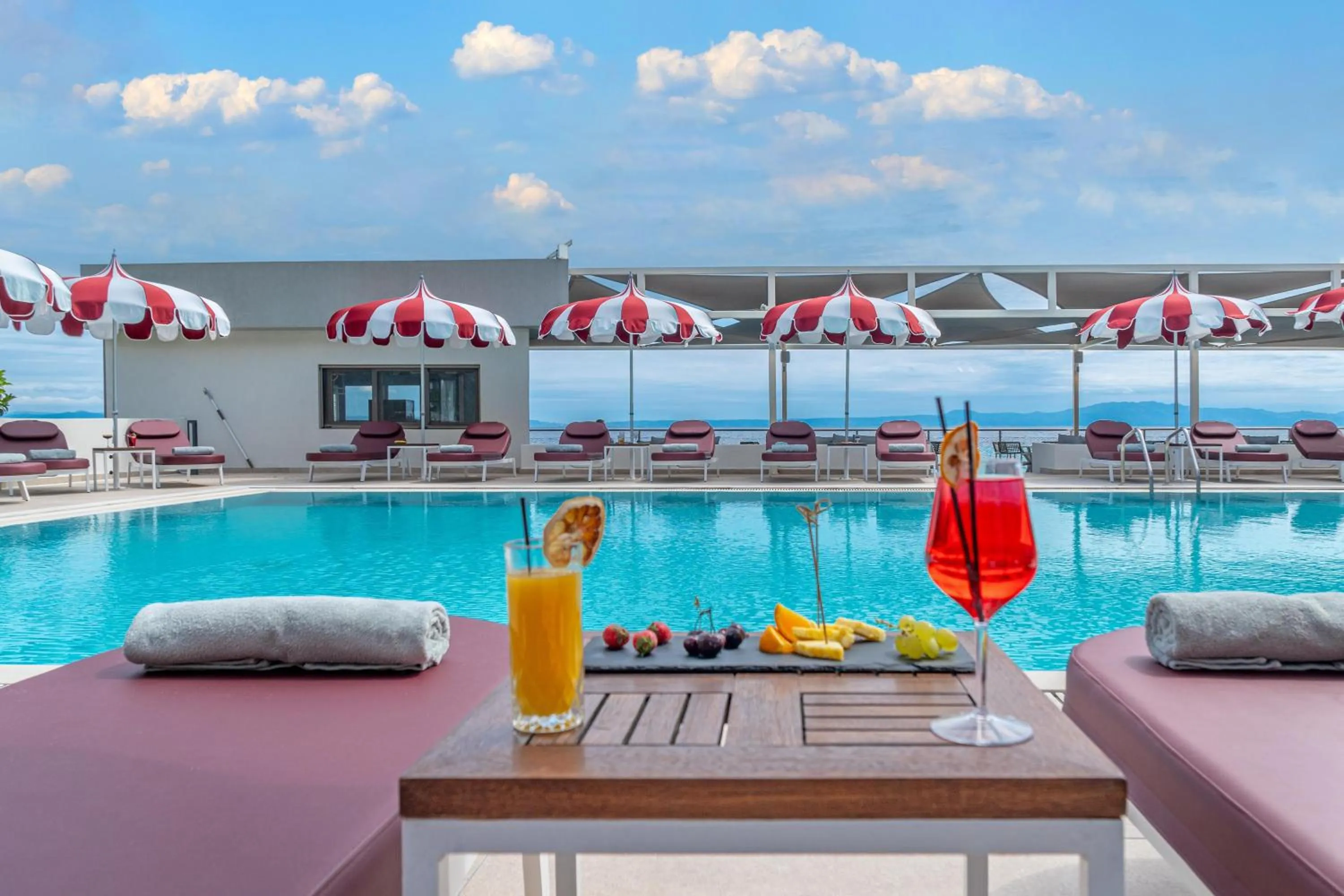 Swimming pool in Ammon Zeus Luxury Beach Hotel