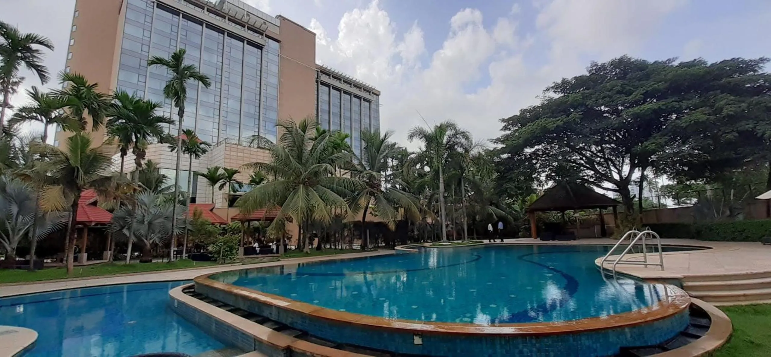 Swimming pool in Crowne Plaza Kochi by IHG