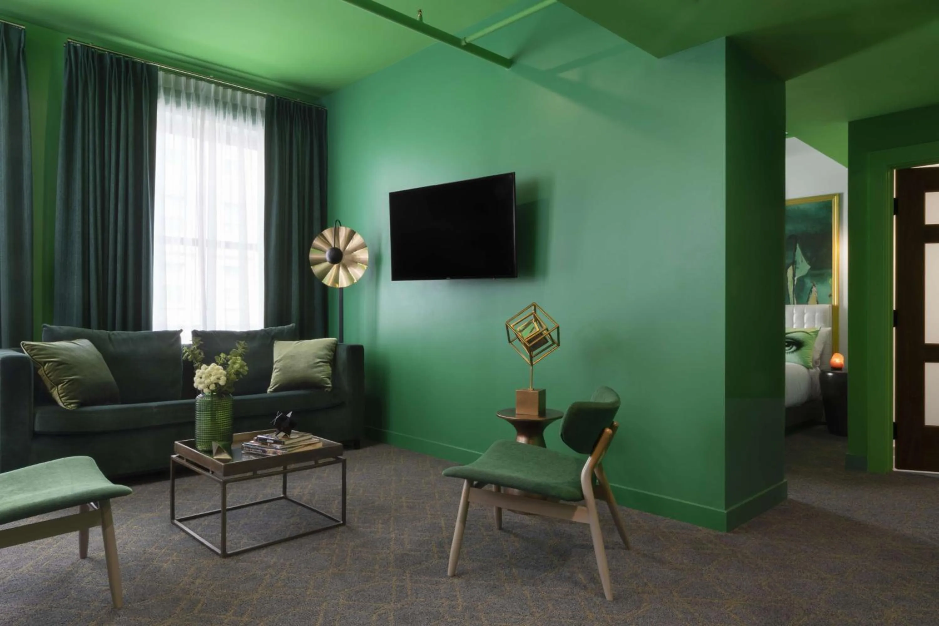 Living room in Angad Arts Hotel St Louis, Tapestry Collection by Hilton