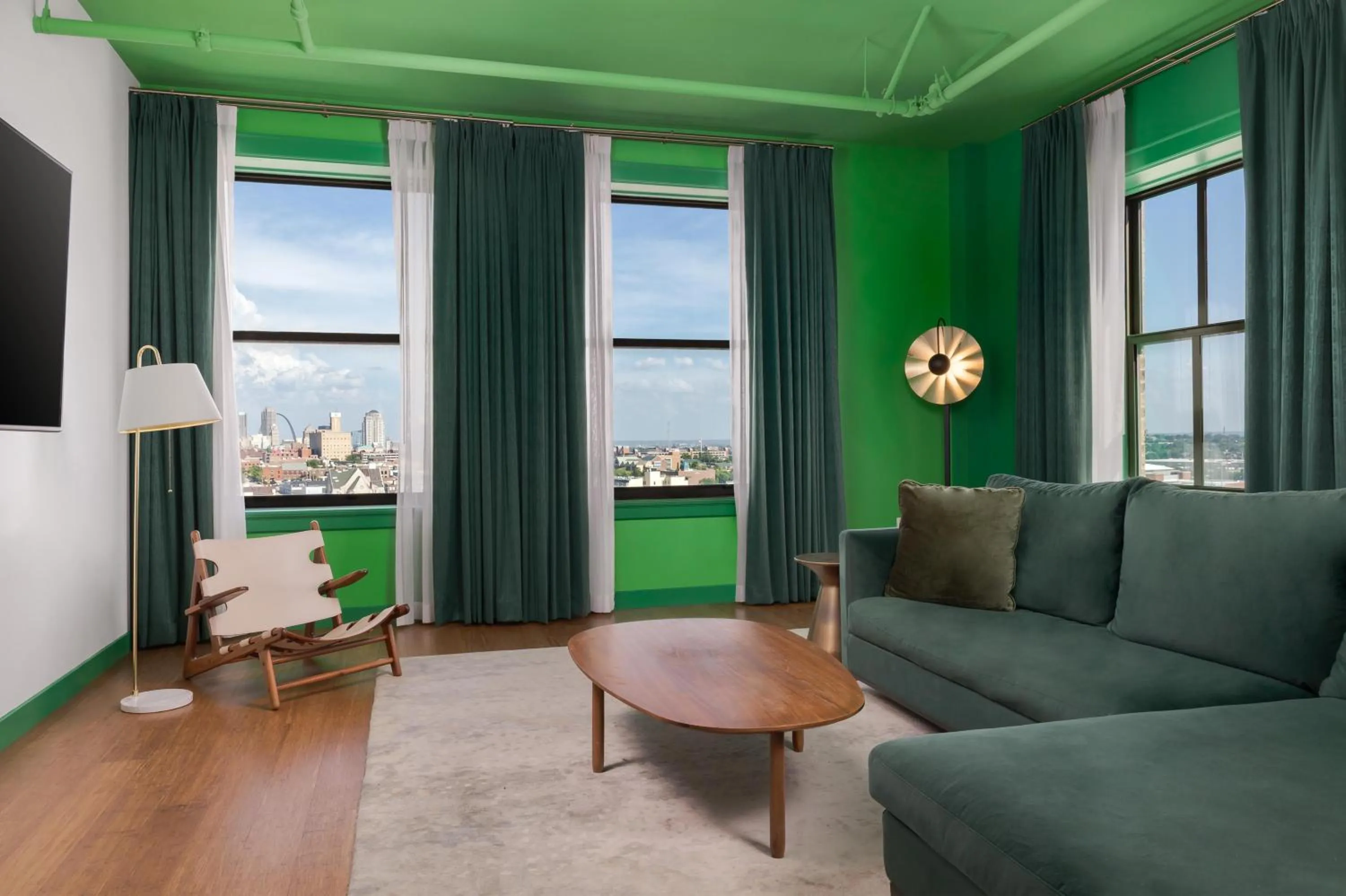 Living room in Angad Arts Hotel St Louis, Tapestry Collection by Hilton