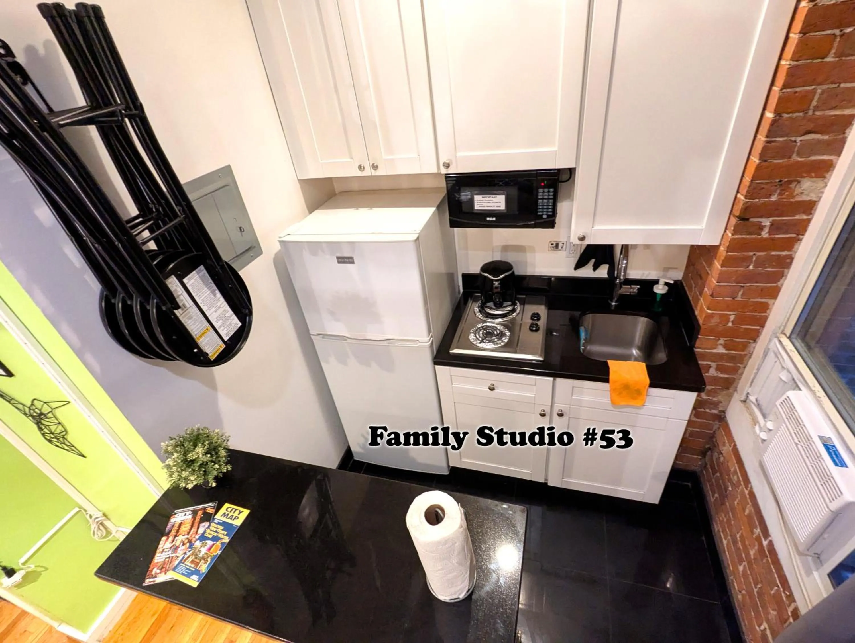 Kitchen or kitchenette in NYC Empire Apartments