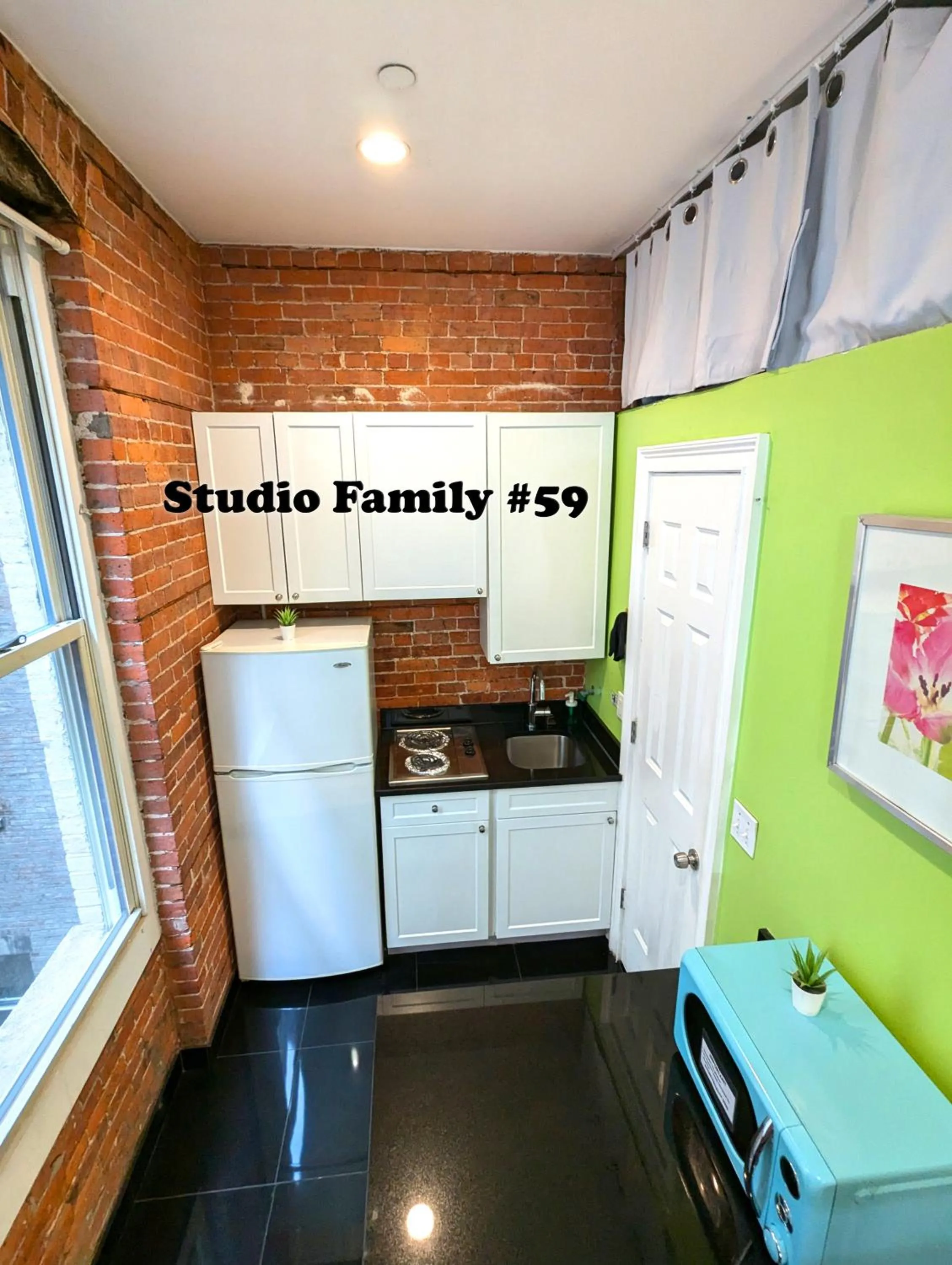 Kitchen or kitchenette in NYC Empire Apartments