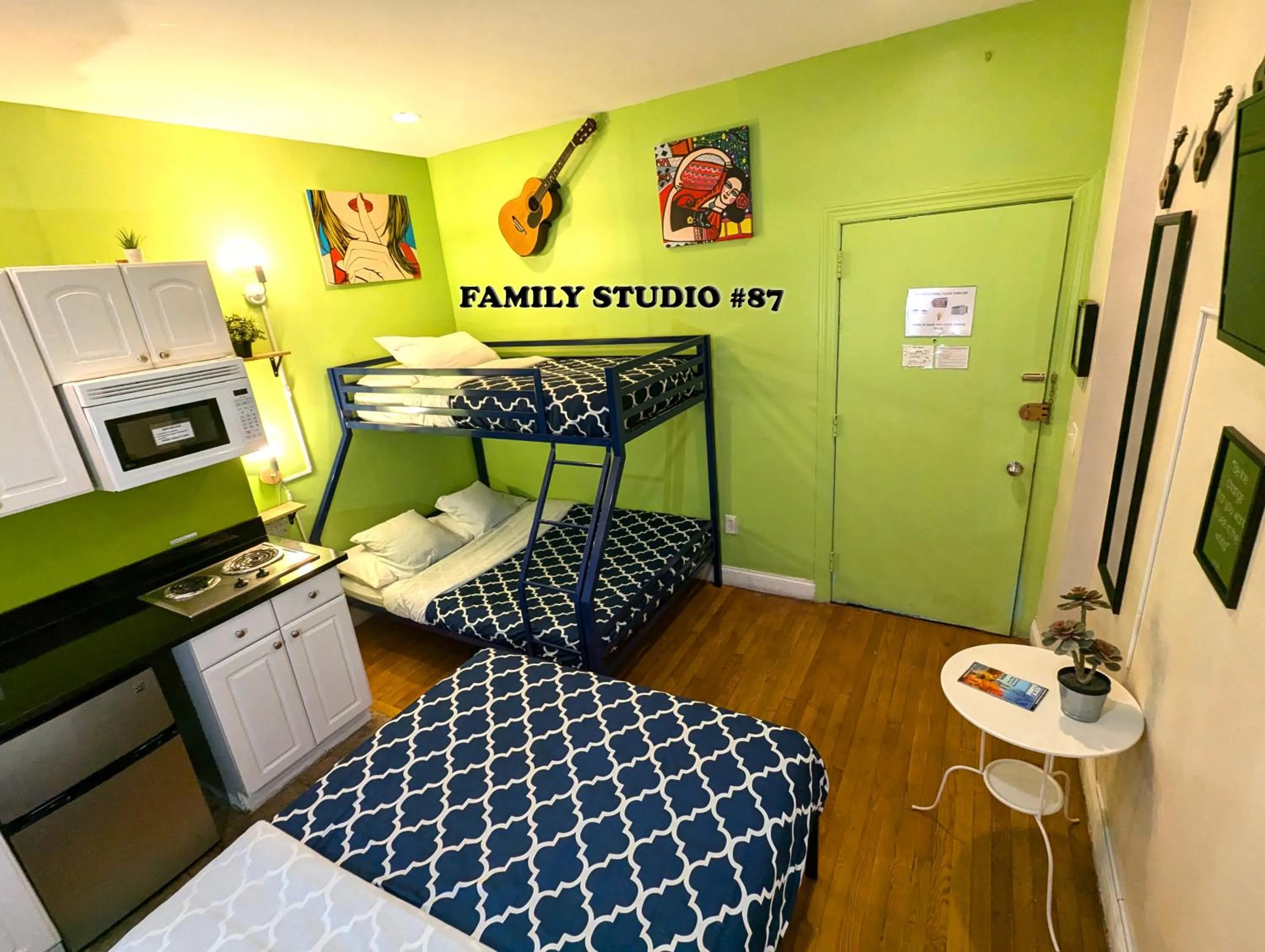 Photo of the whole room, Bed in NYC Empire Apartments