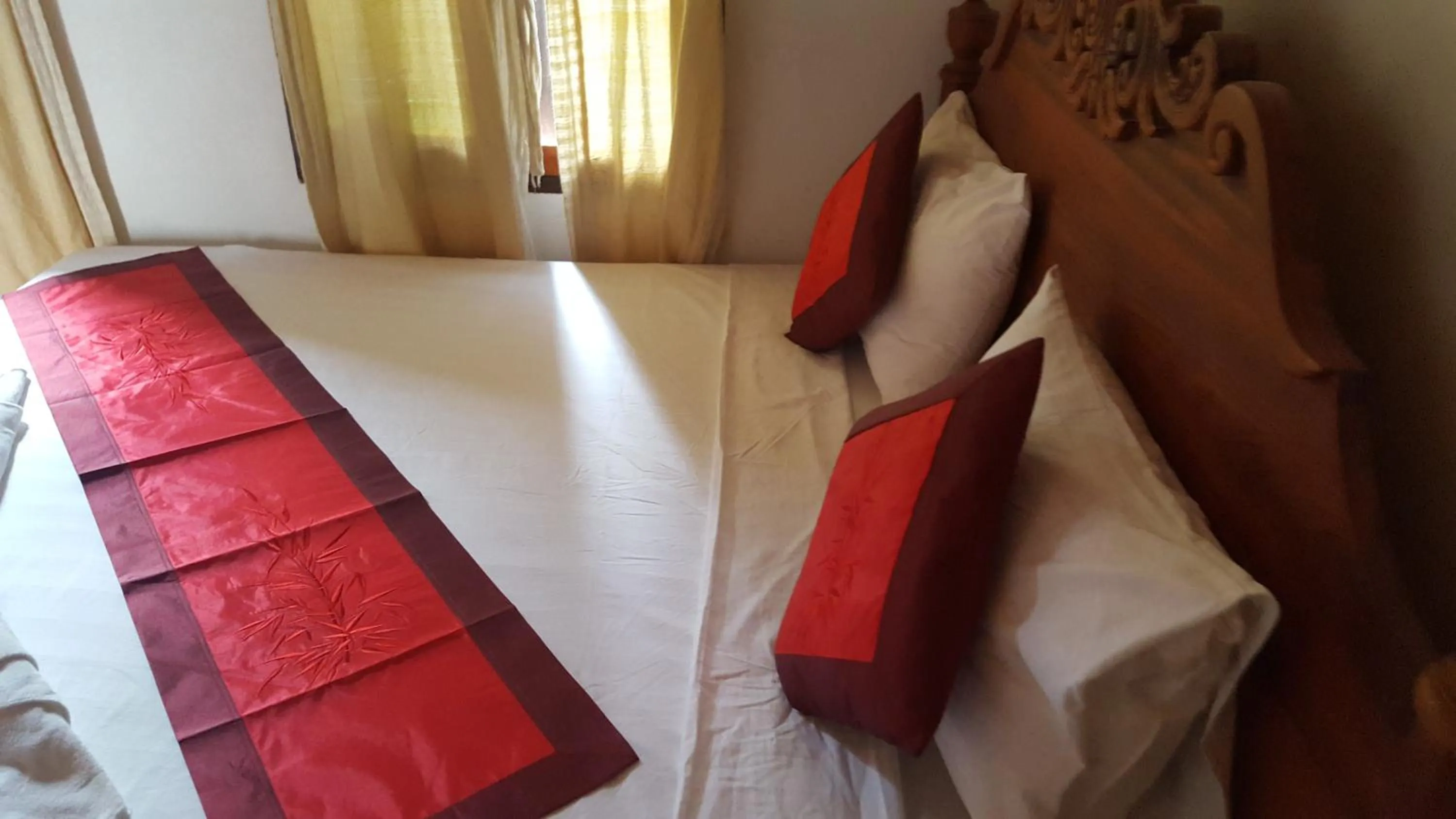 Bed in Villa Rattanakon