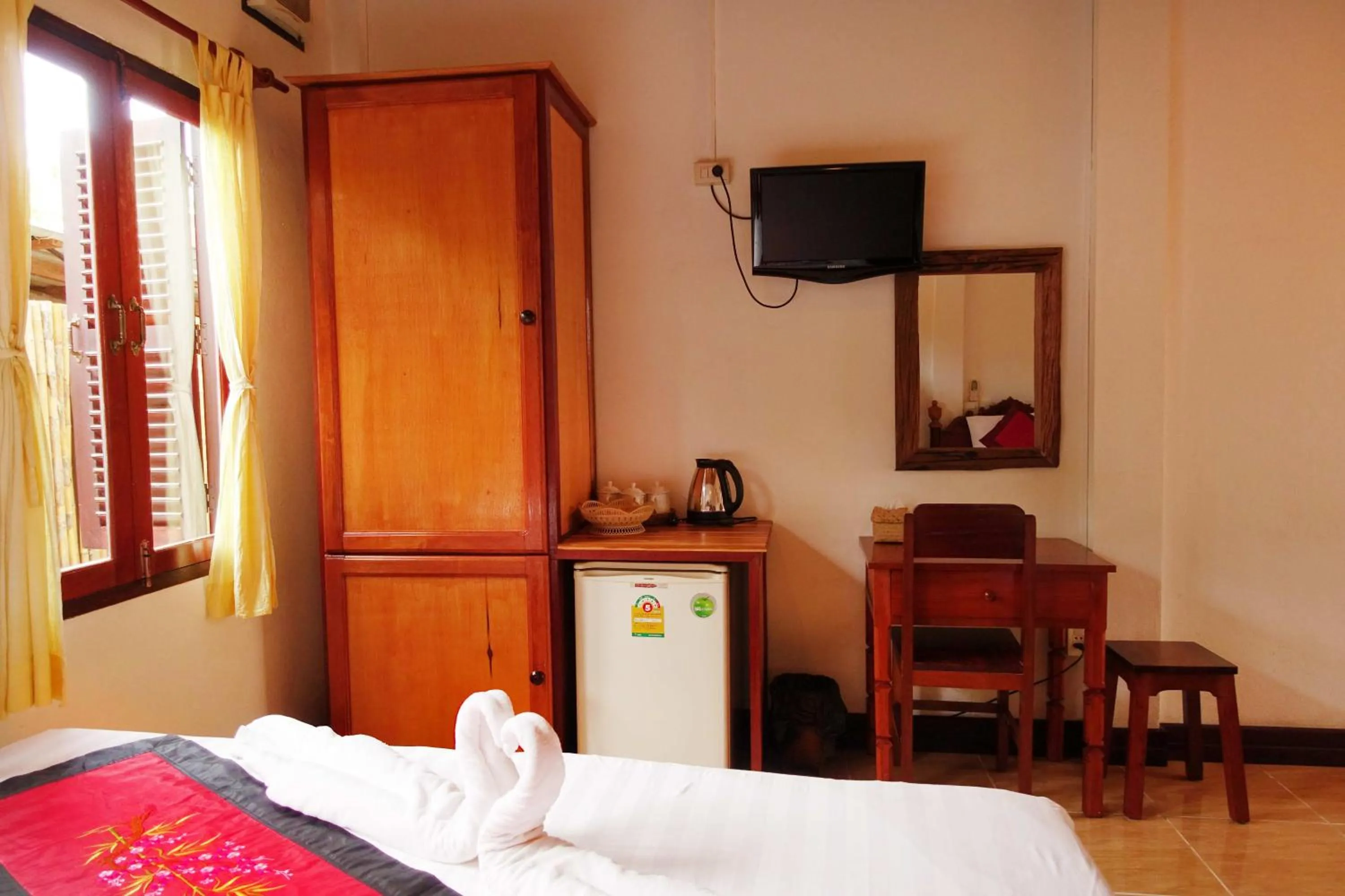 Bed in Villa Rattanakon