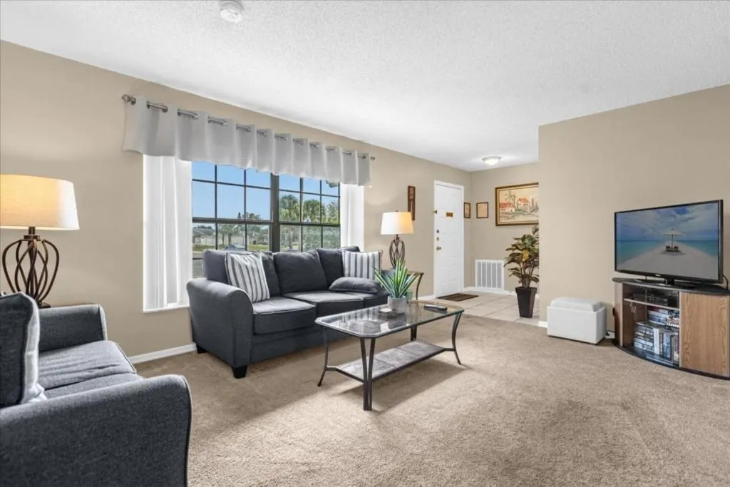 Living room in Private Pool Homes