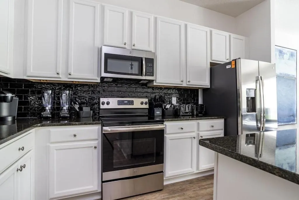 Kitchen or kitchenette in Private Pool Homes