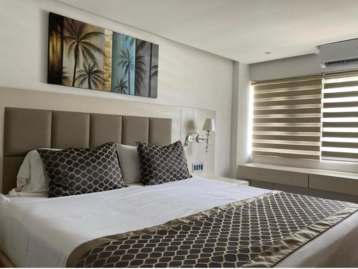 Bed in Port de Plaisance Resort, Trademark Collection by Wyndham