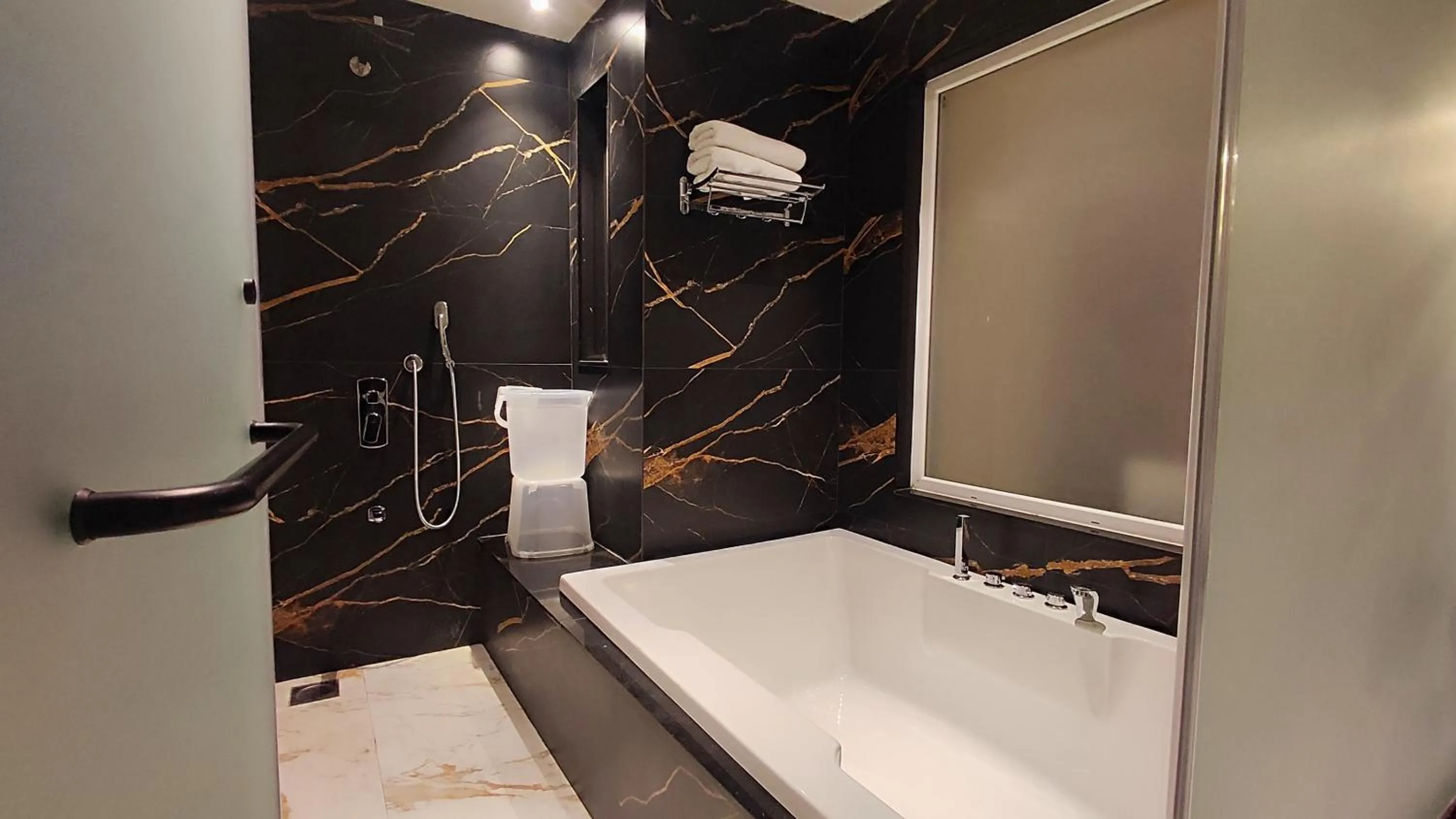 Shower in Manas Lifestyle Resort Igatpuri