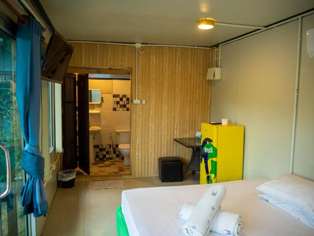Bed in Beach Box Resort at Rimlay Rayong