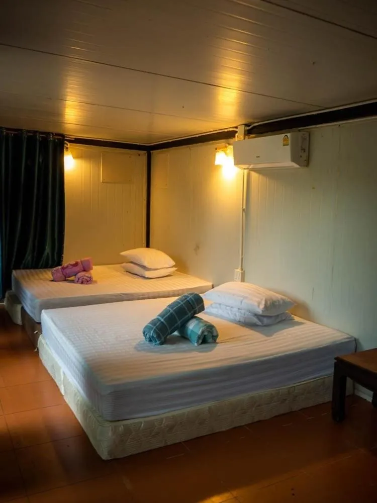 Bed in Beach Box Resort at Rimlay Rayong