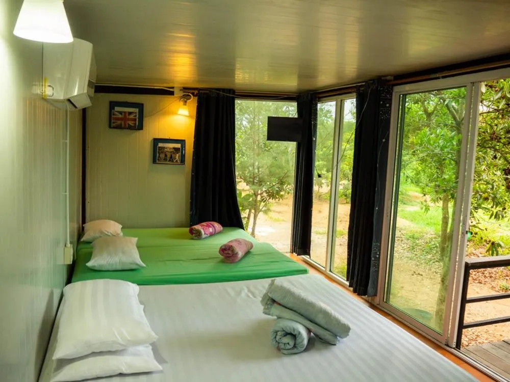 Bed in Beach Box Resort at Rimlay Rayong