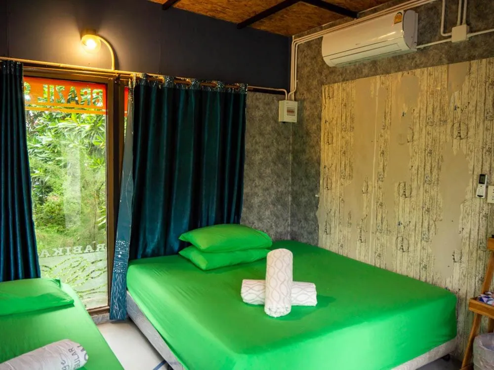 Bed in Beach Box Resort at Rimlay Rayong