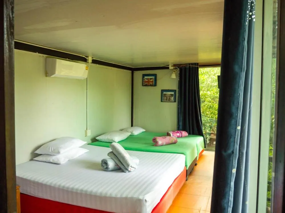 Bed in Beach Box Resort at Rimlay Rayong