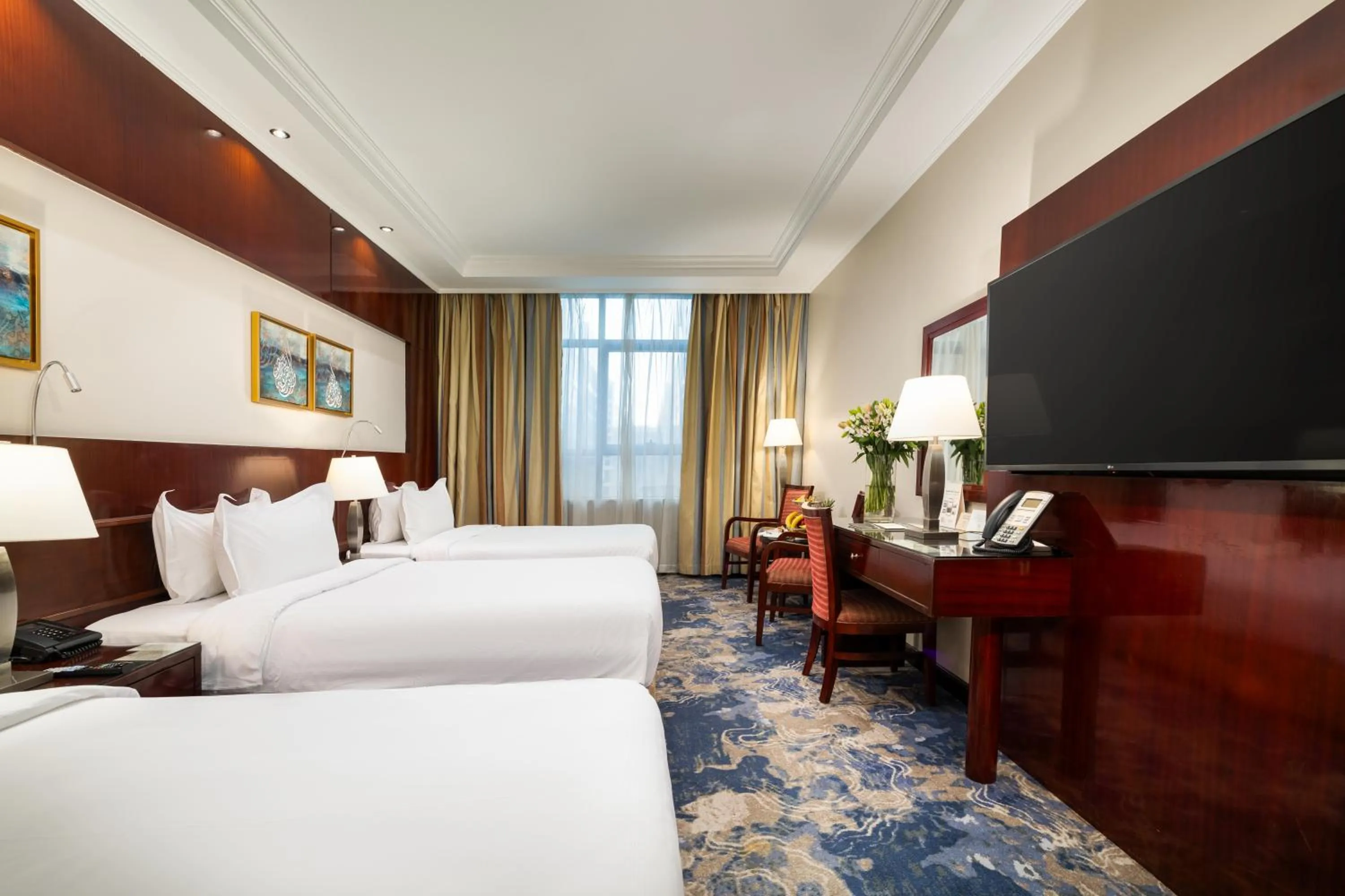 Bed in Emaar Royal Hotel