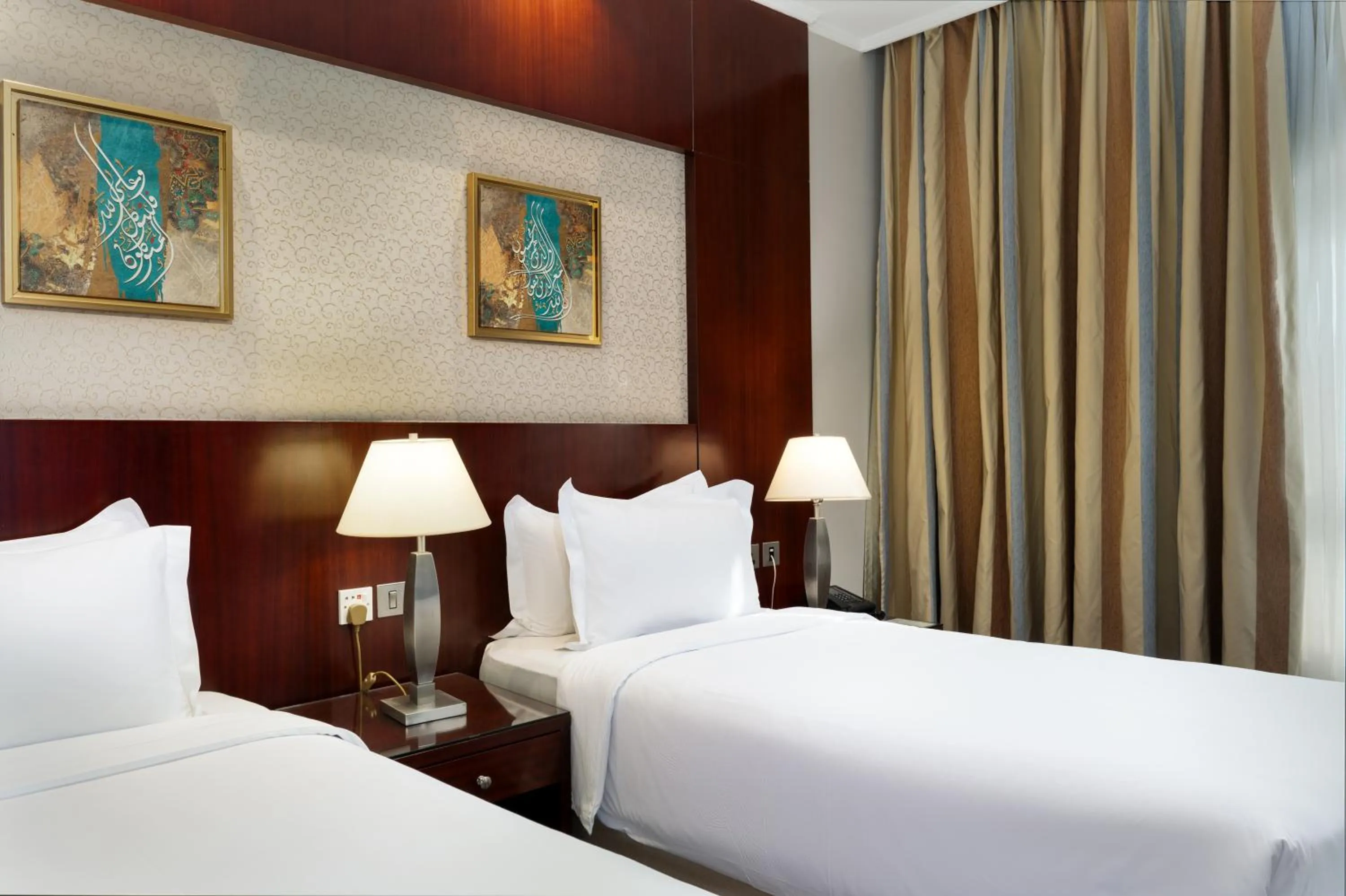 Bed in Emaar Royal Hotel