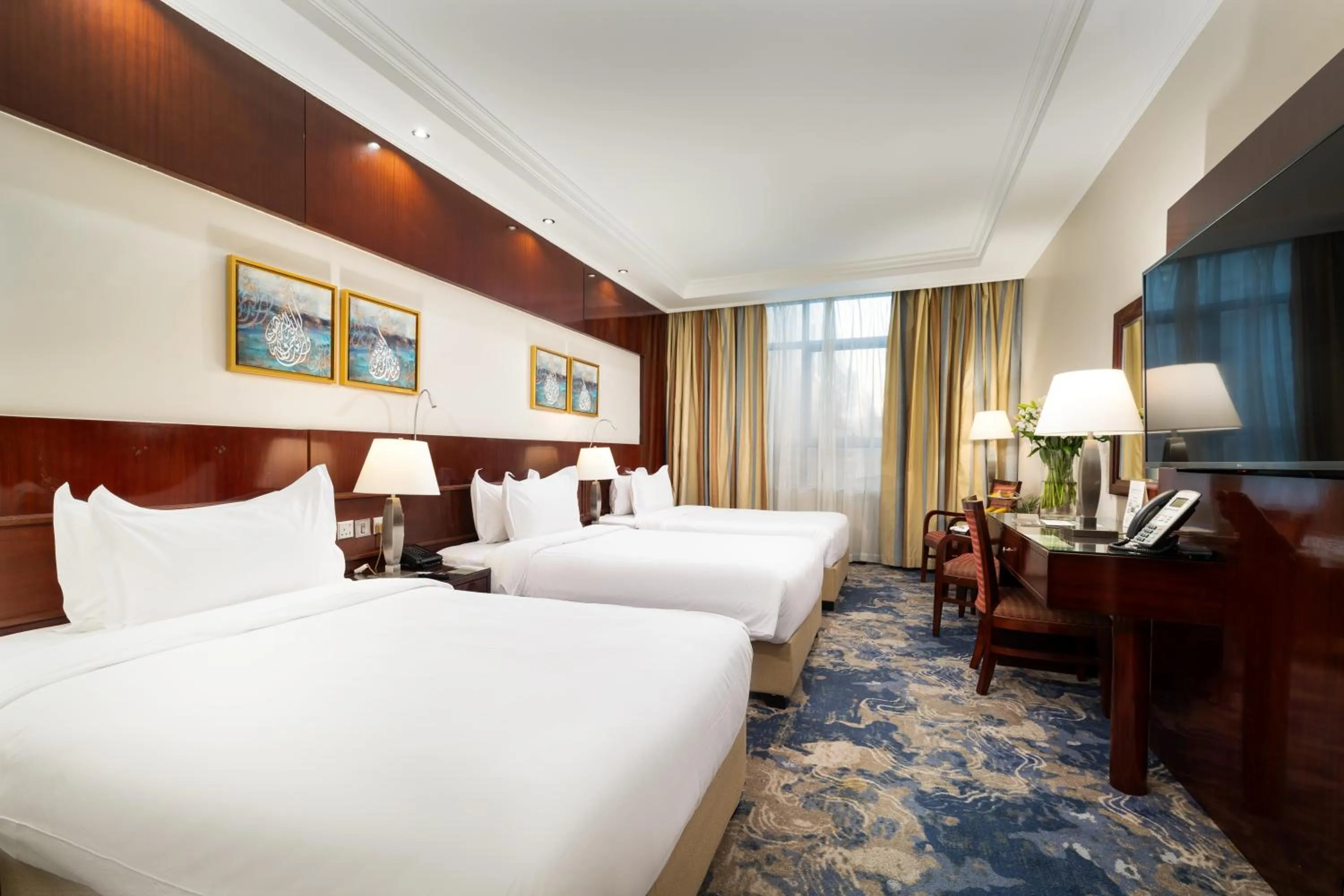 Bed in Emaar Royal Hotel