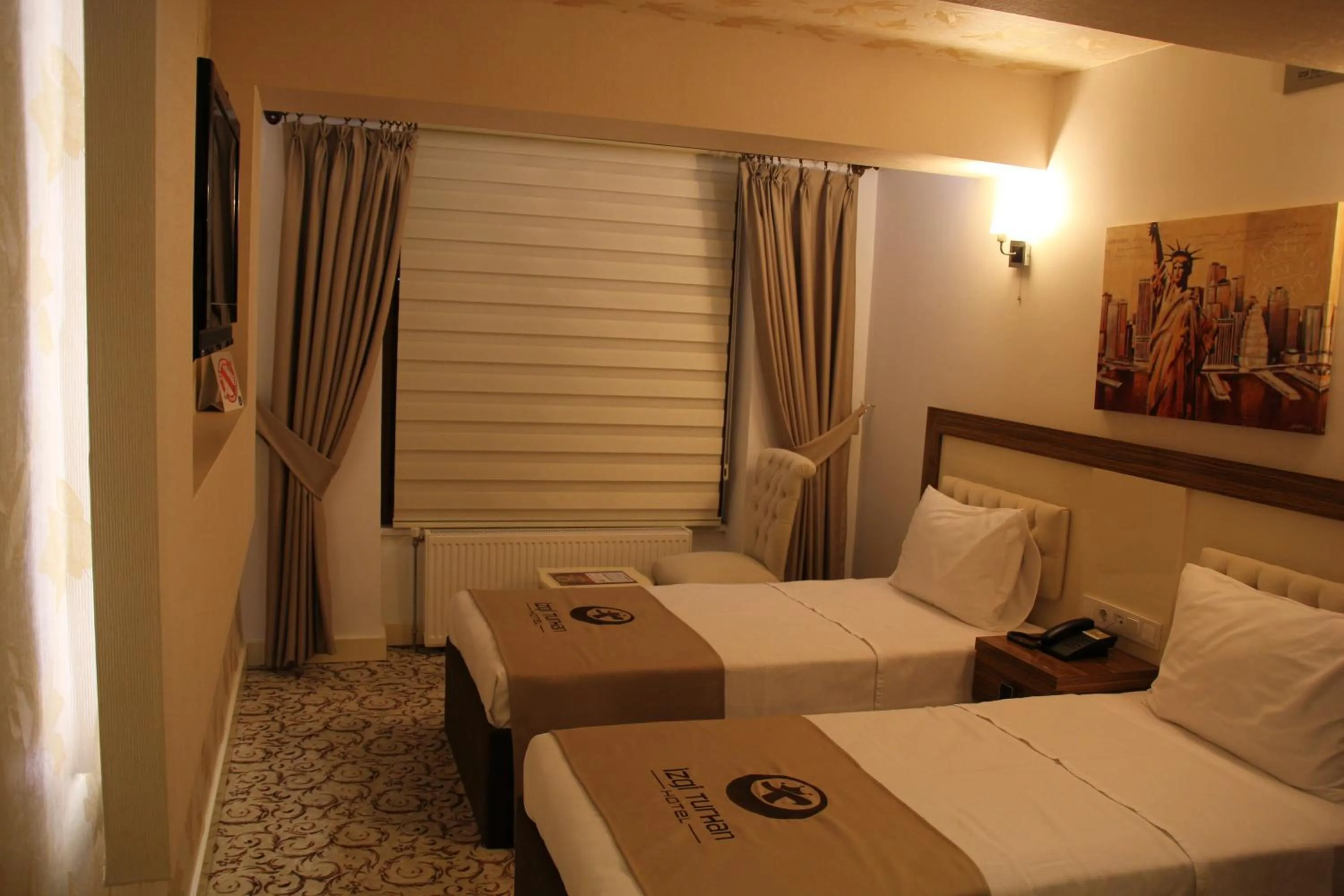Bed in Hotel Izgi Turhan