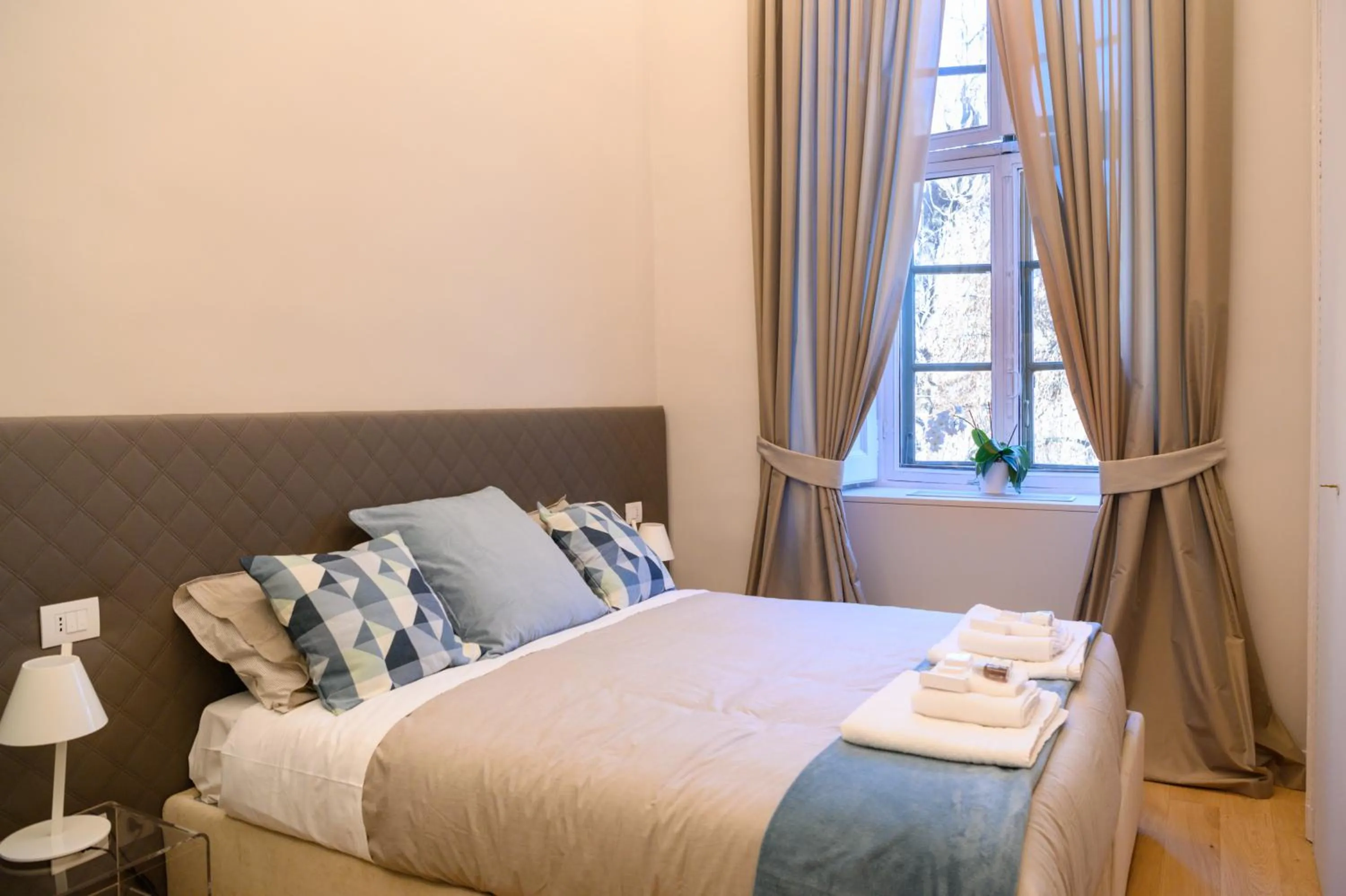 Bed in Savoia Suites Torino