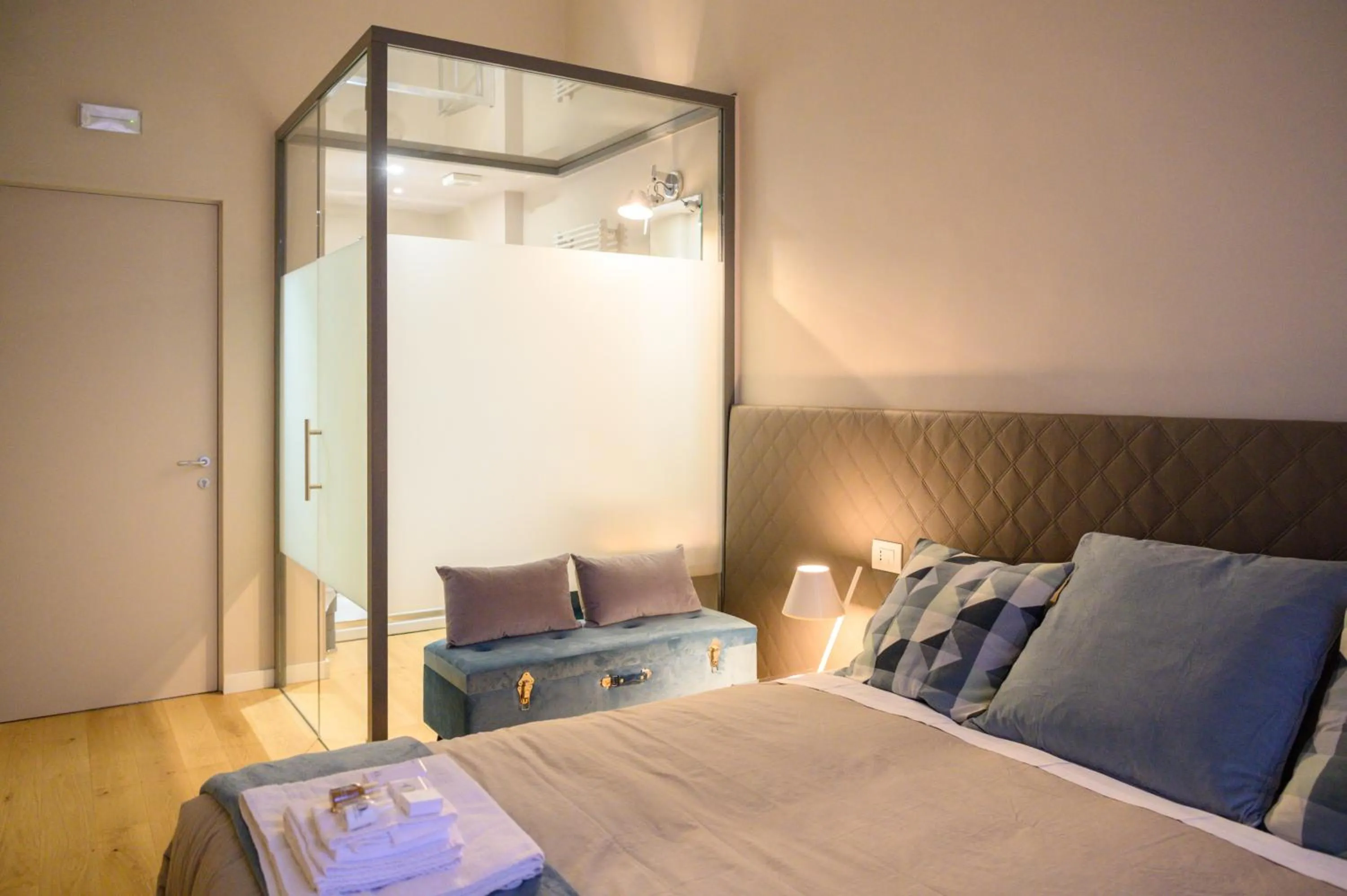 Bed in Savoia Suites Torino