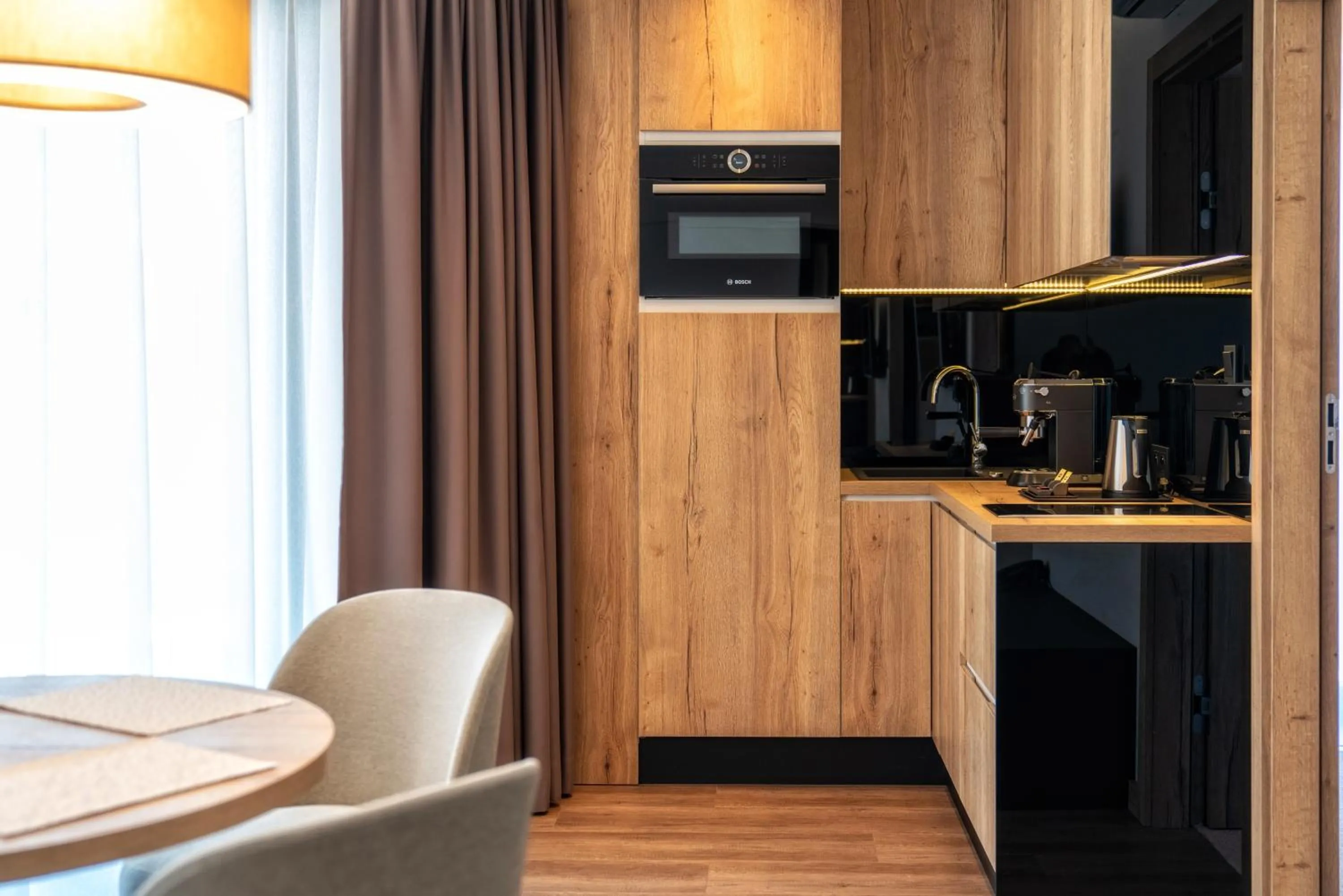 Kitchen or kitchenette in Meta Apartments