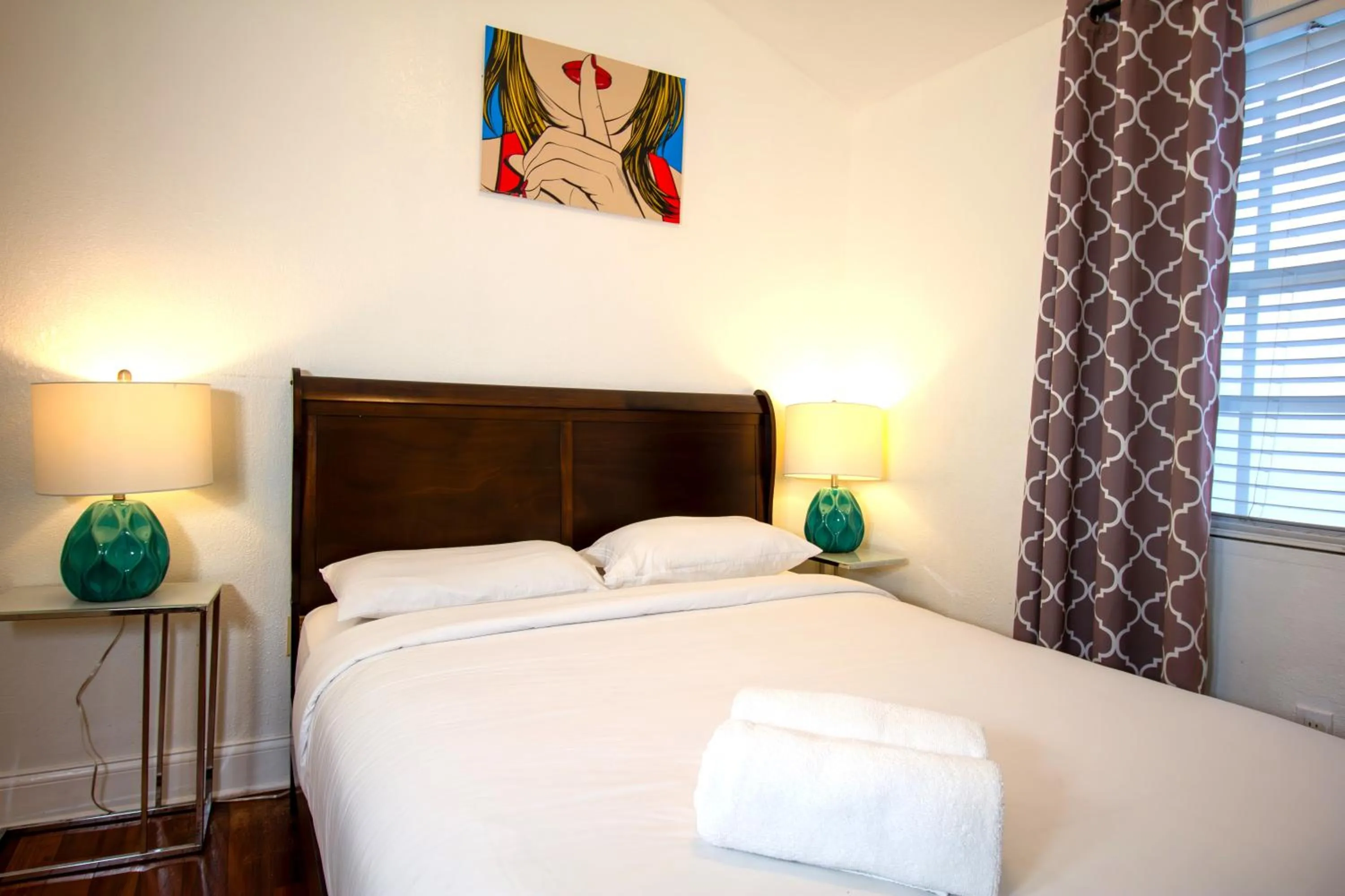 Bed in Hispaniola Apartments Part of the Oasis Casita Collection