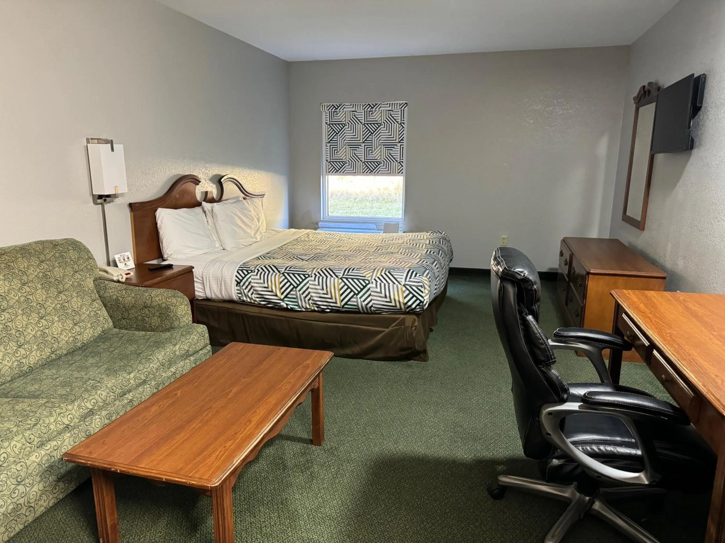 Living room in Star City Inn & Suites