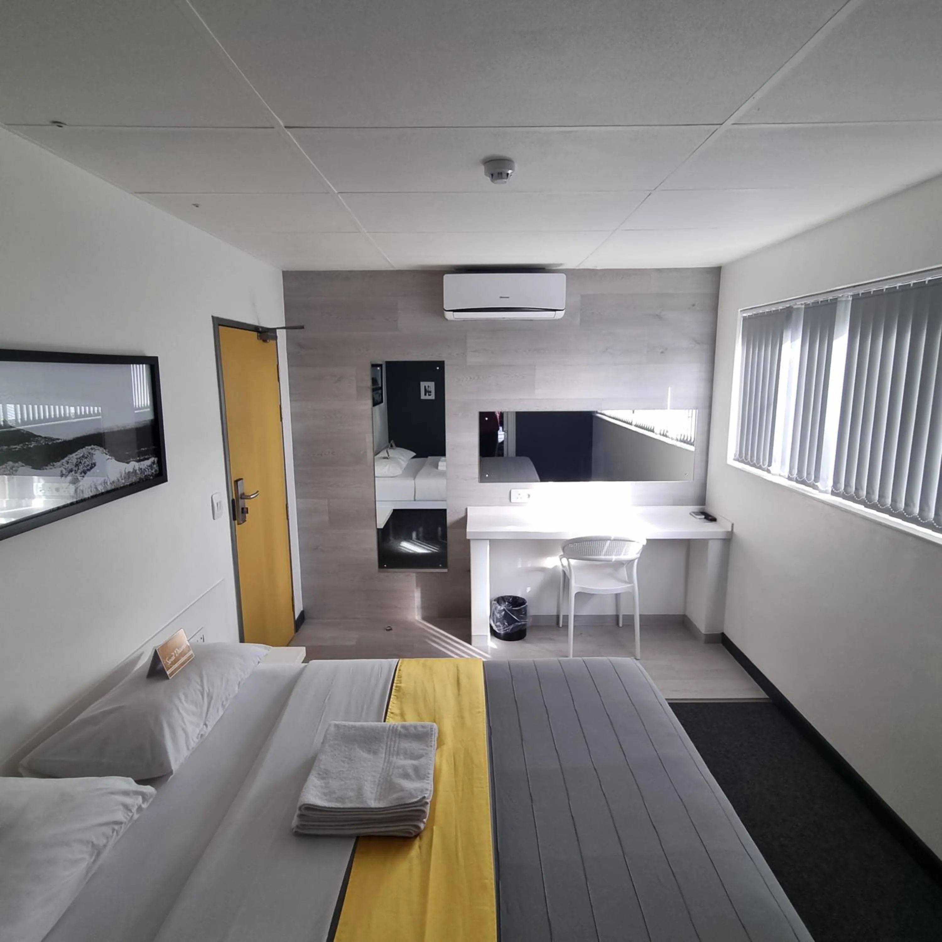 Bed in Check Inn Hotel