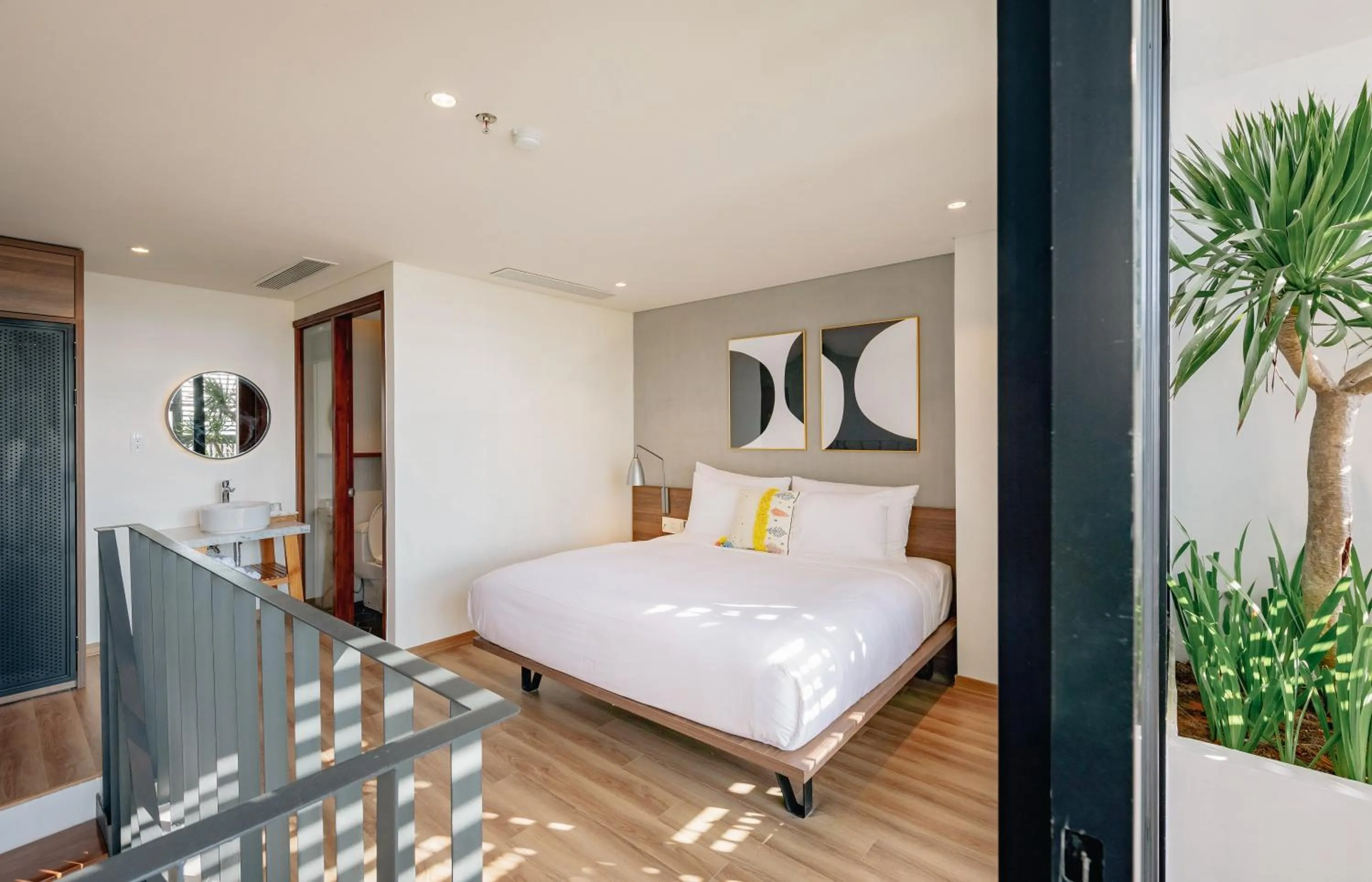 Living room, Bed in The Glomad Boutique Danang