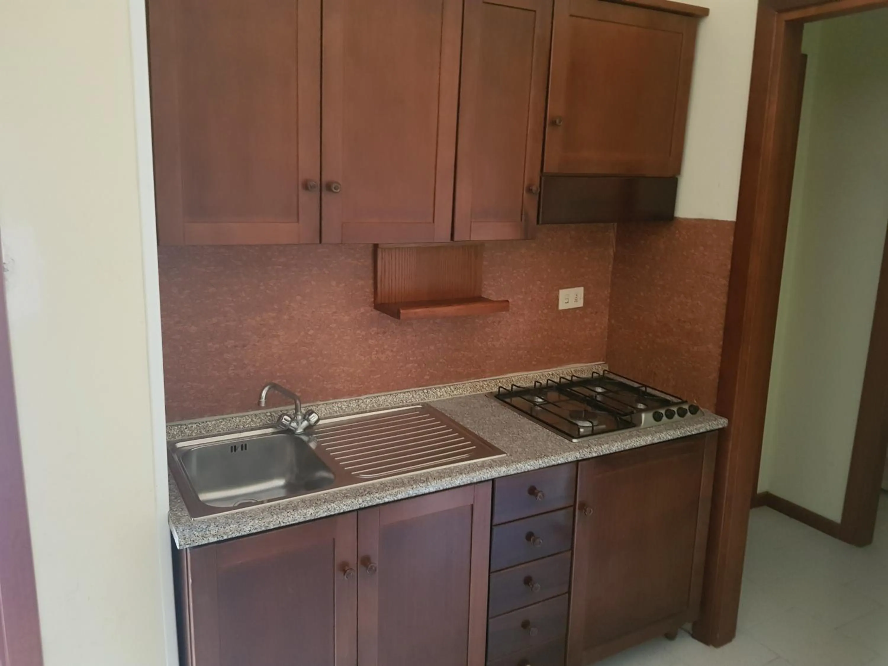 Kitchen or kitchenette in Oasi Club Village