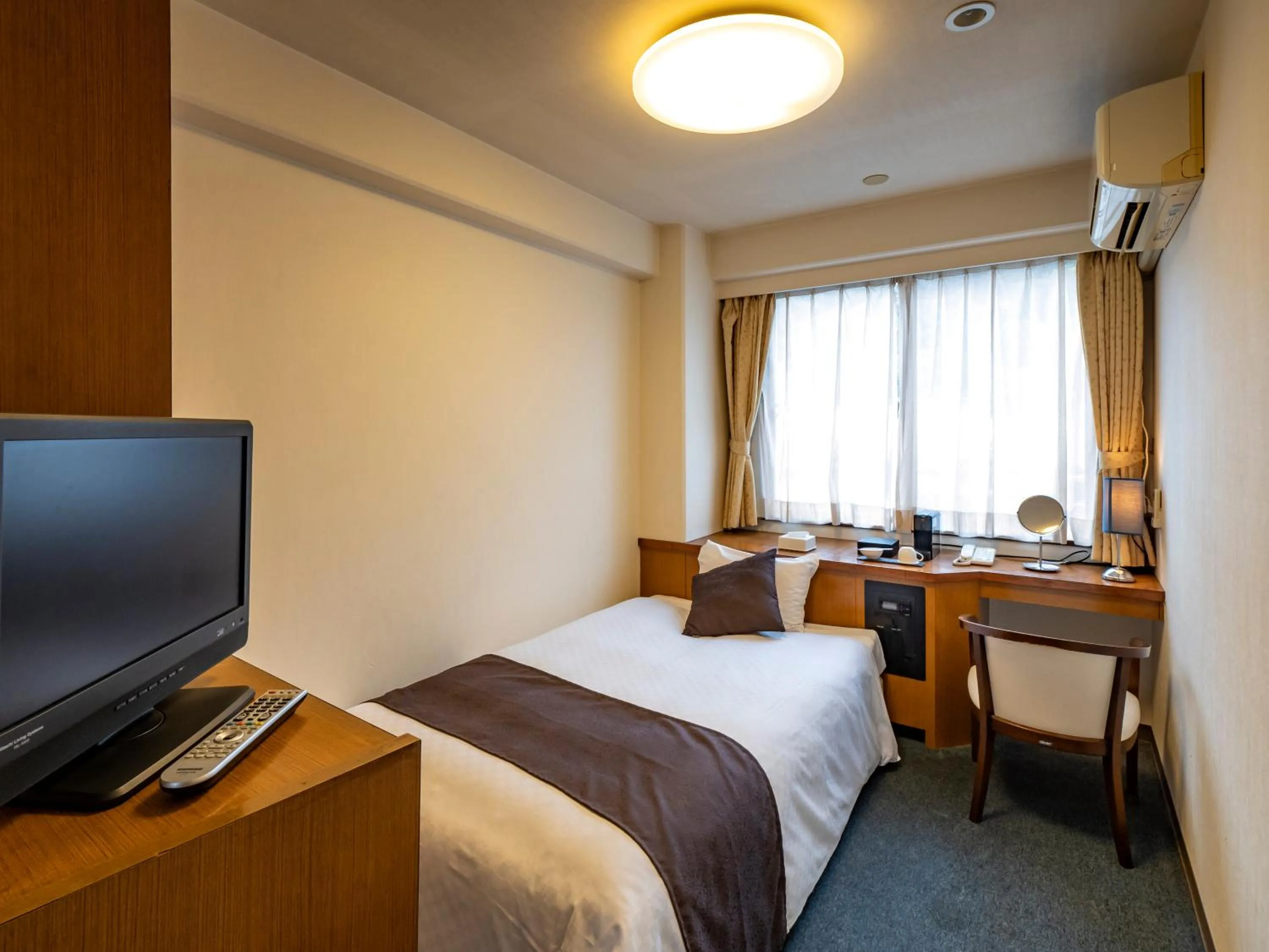 Bed in Hotel Fukiageso