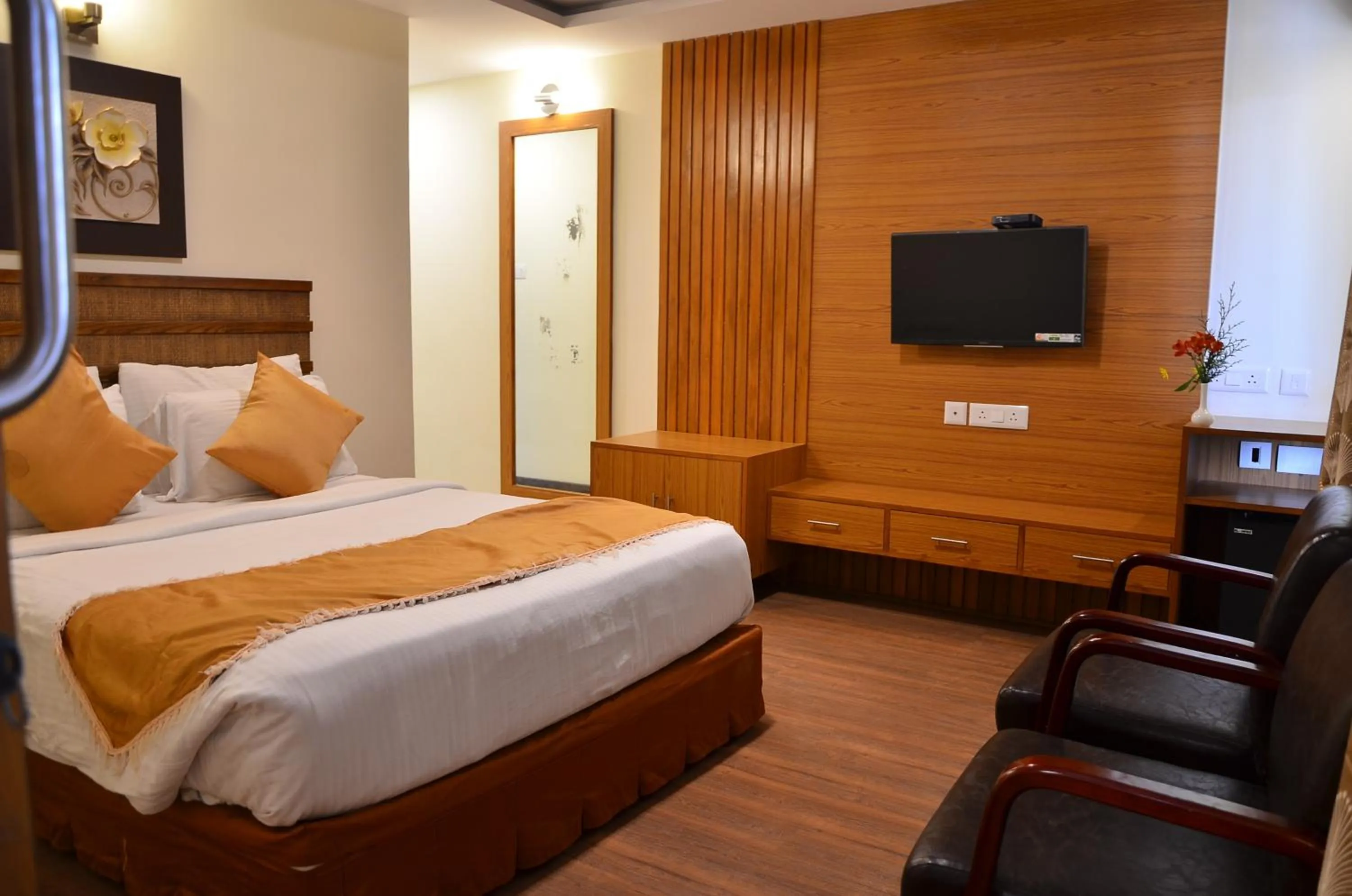 Living room, Bed in Benzz Park Family Resort Kodaikanal