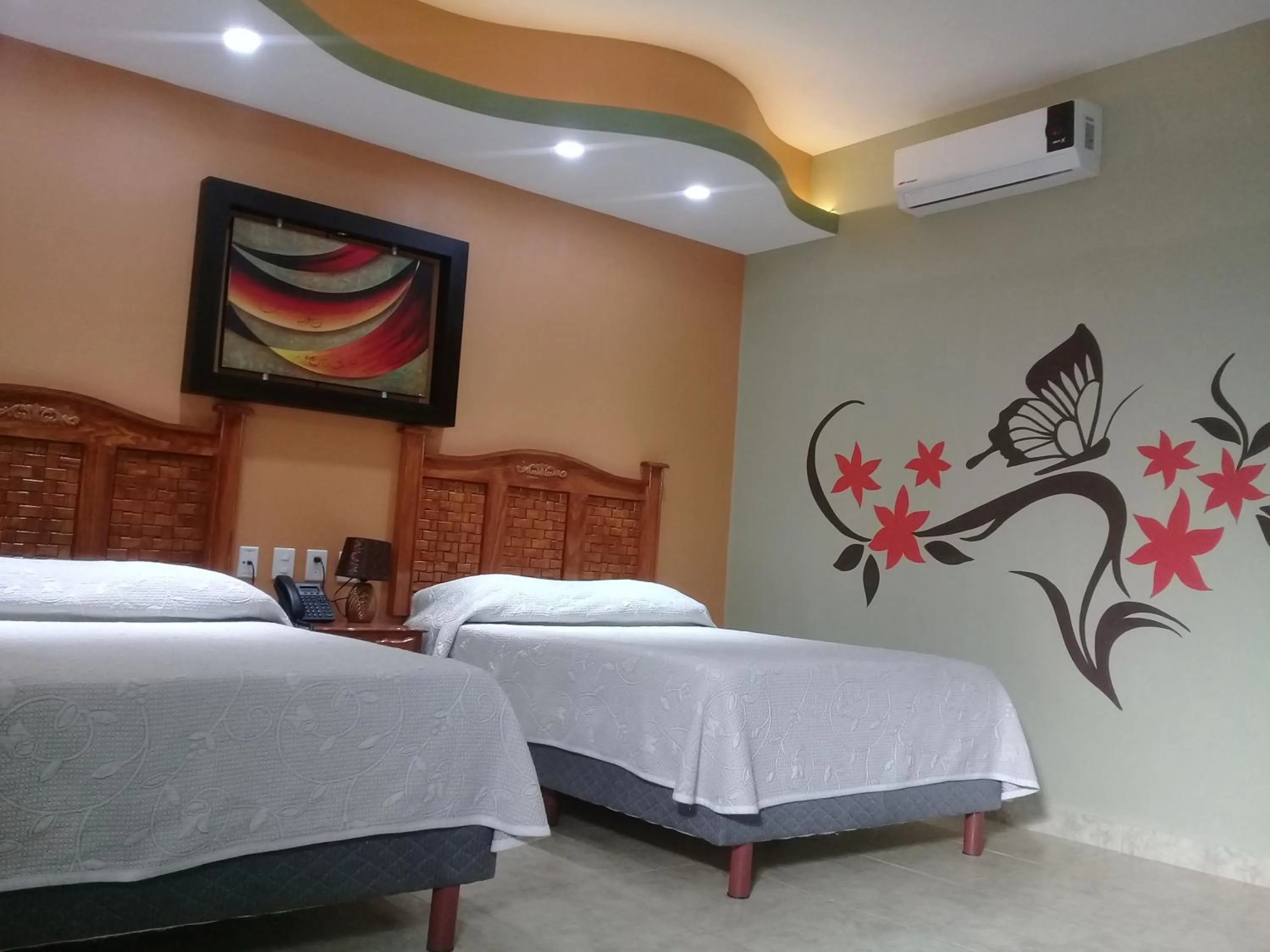 Bed in HOTEL RESTAURANTE TEQUILA