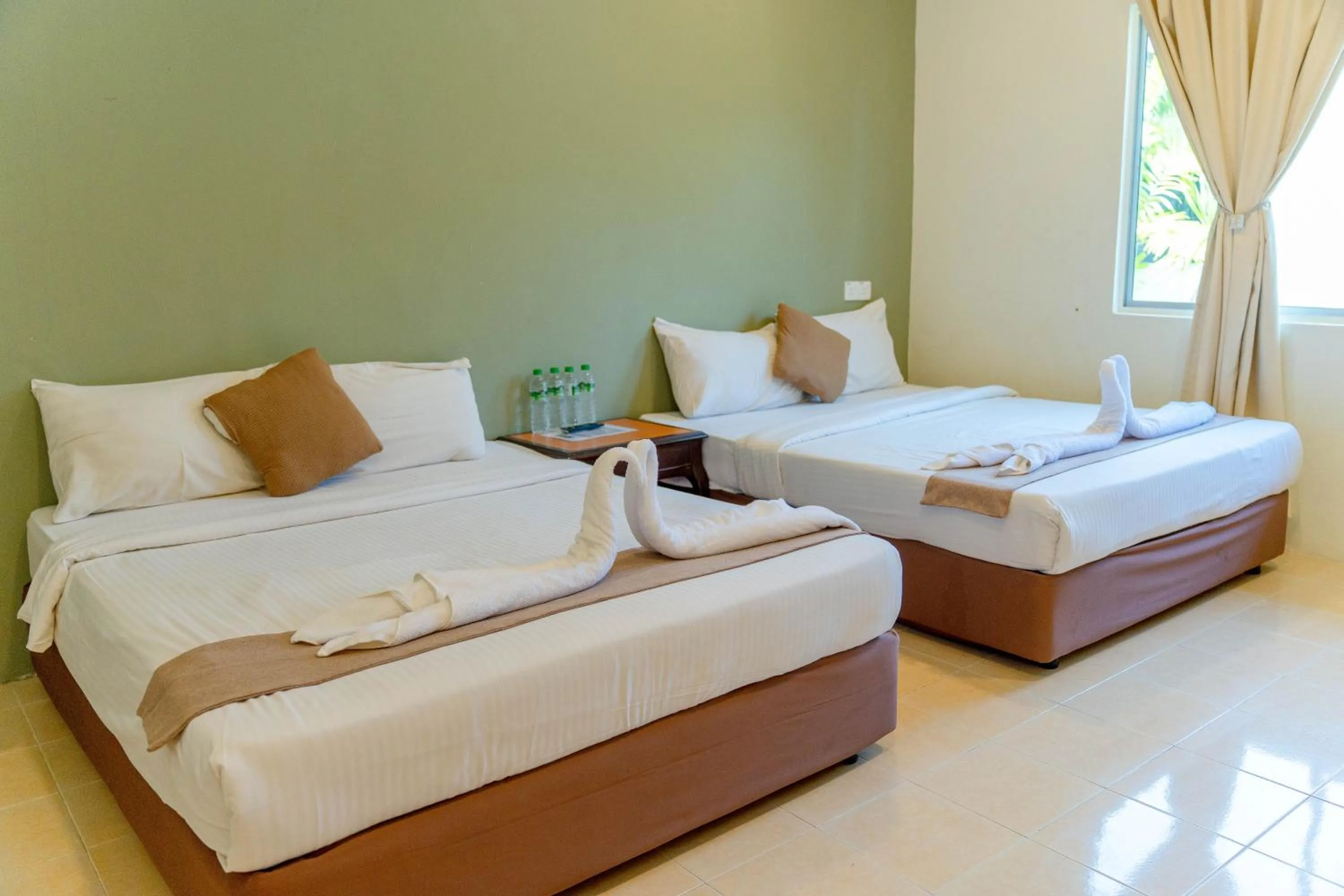 Bed in SANDY GARDEN RESORT LANGKAWI