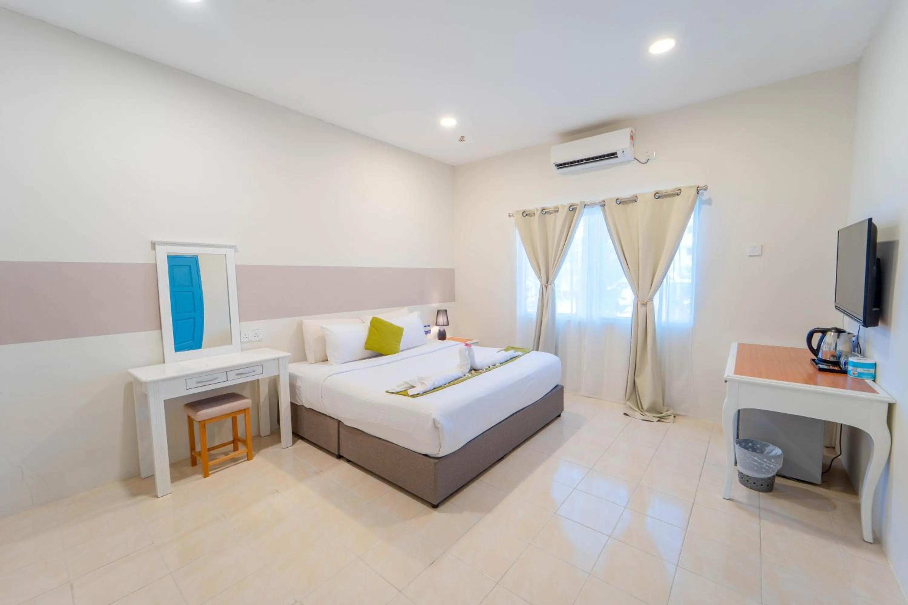 Bed in SANDY GARDEN RESORT LANGKAWI