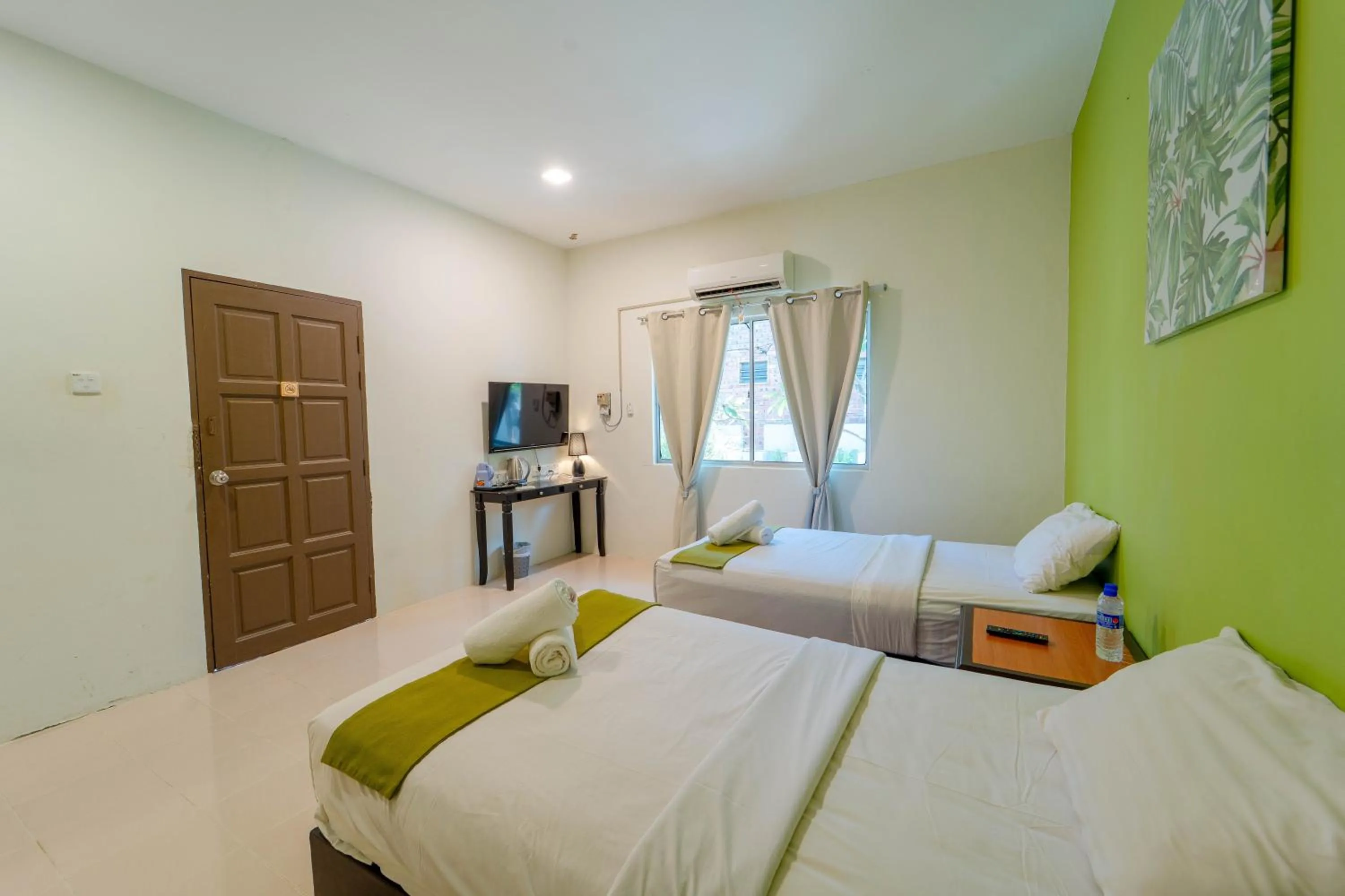 Bed in SANDY GARDEN RESORT LANGKAWI