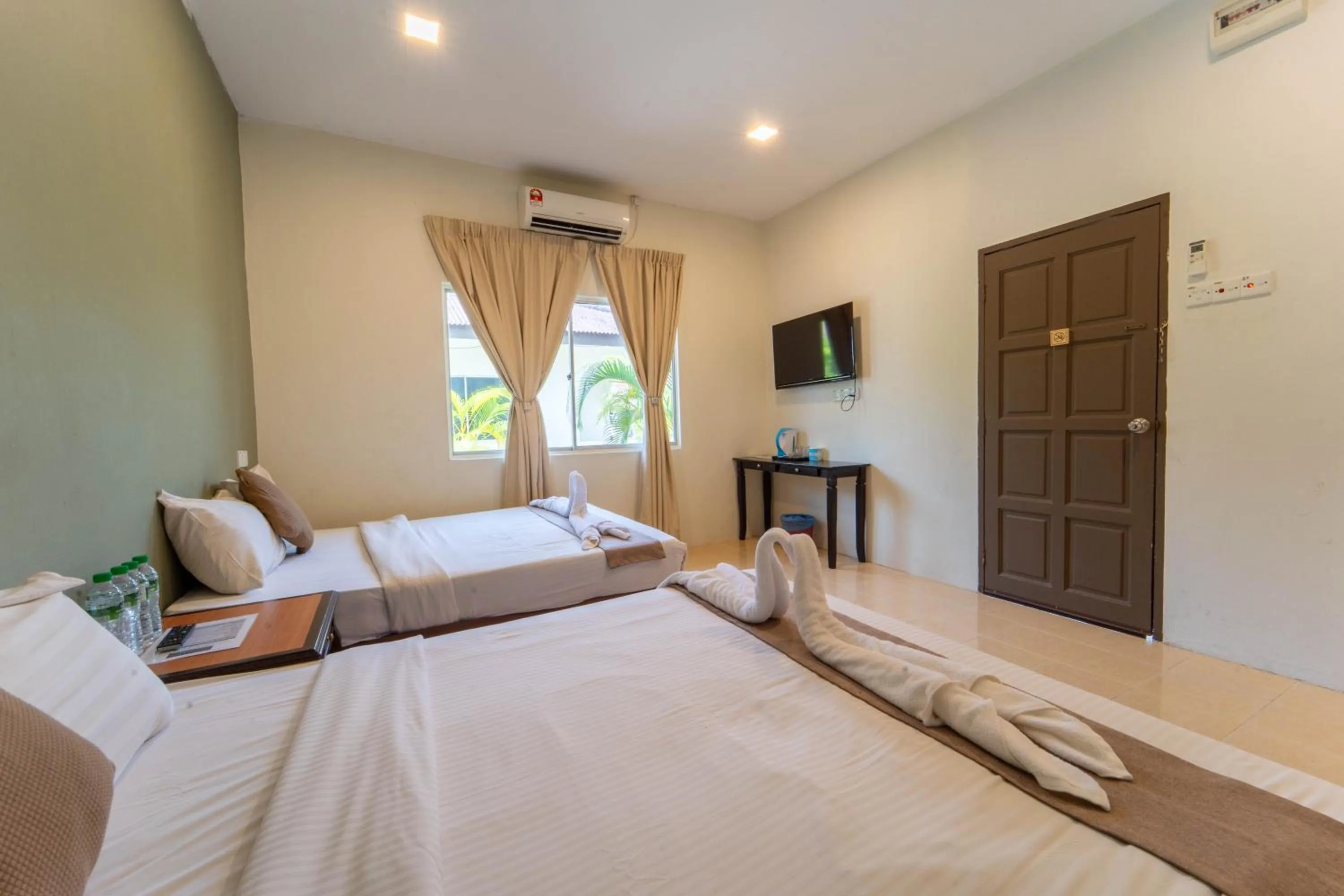 Bed in SANDY GARDEN RESORT LANGKAWI