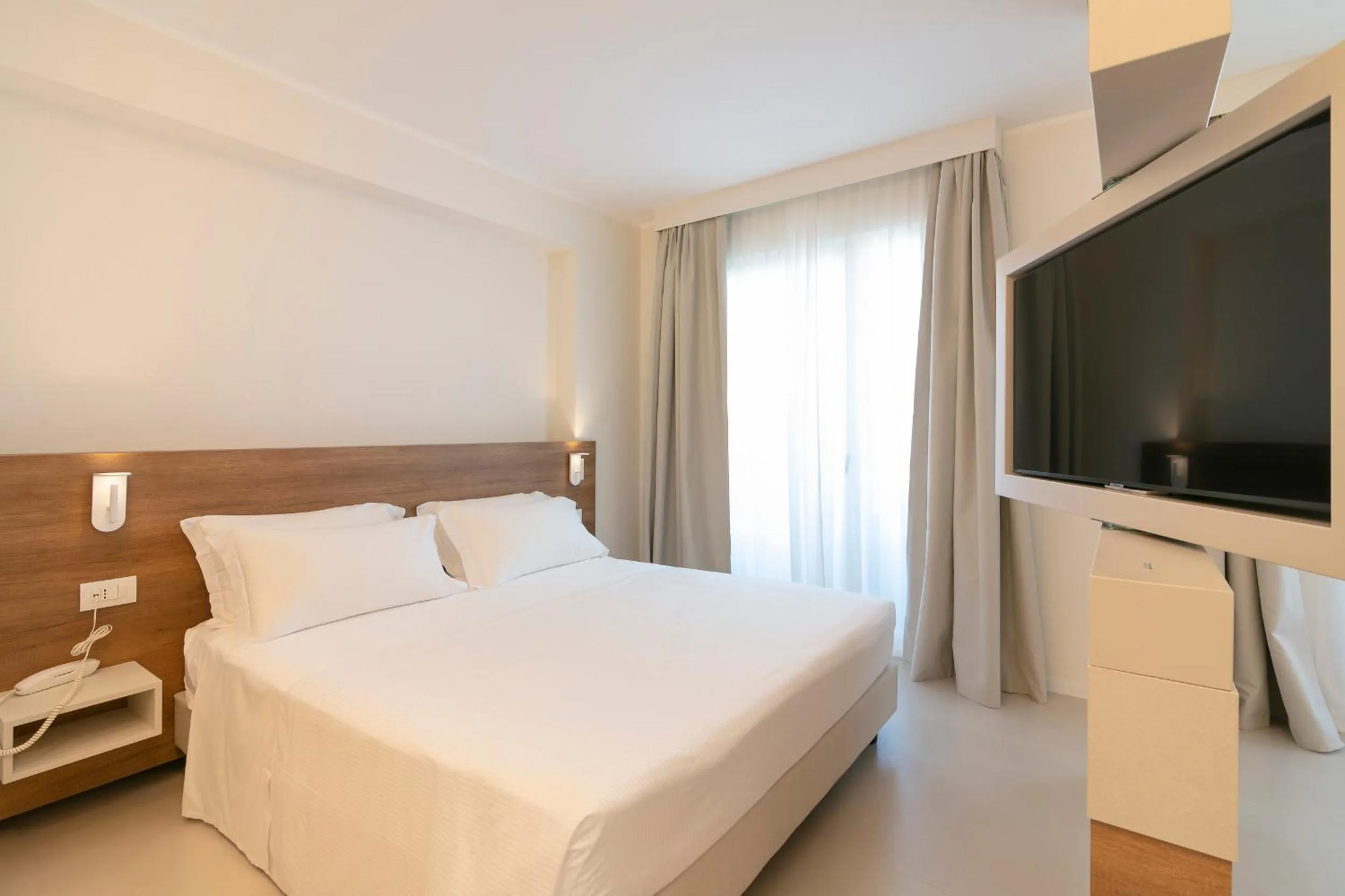 Bed in Hotel Mistral