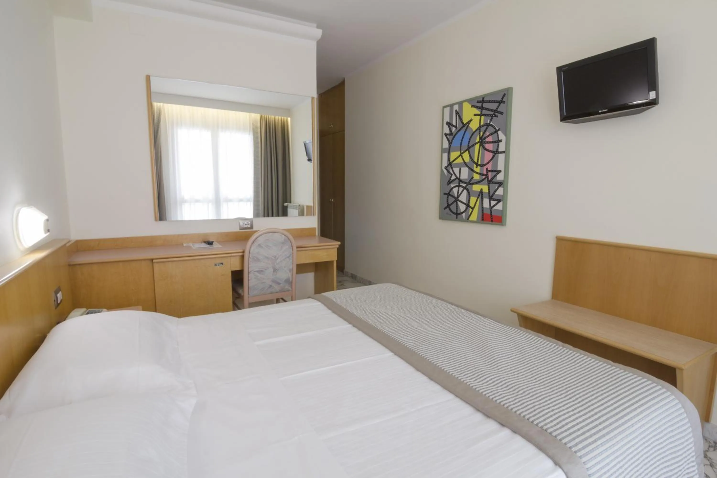 Bed in Hotel Mistral