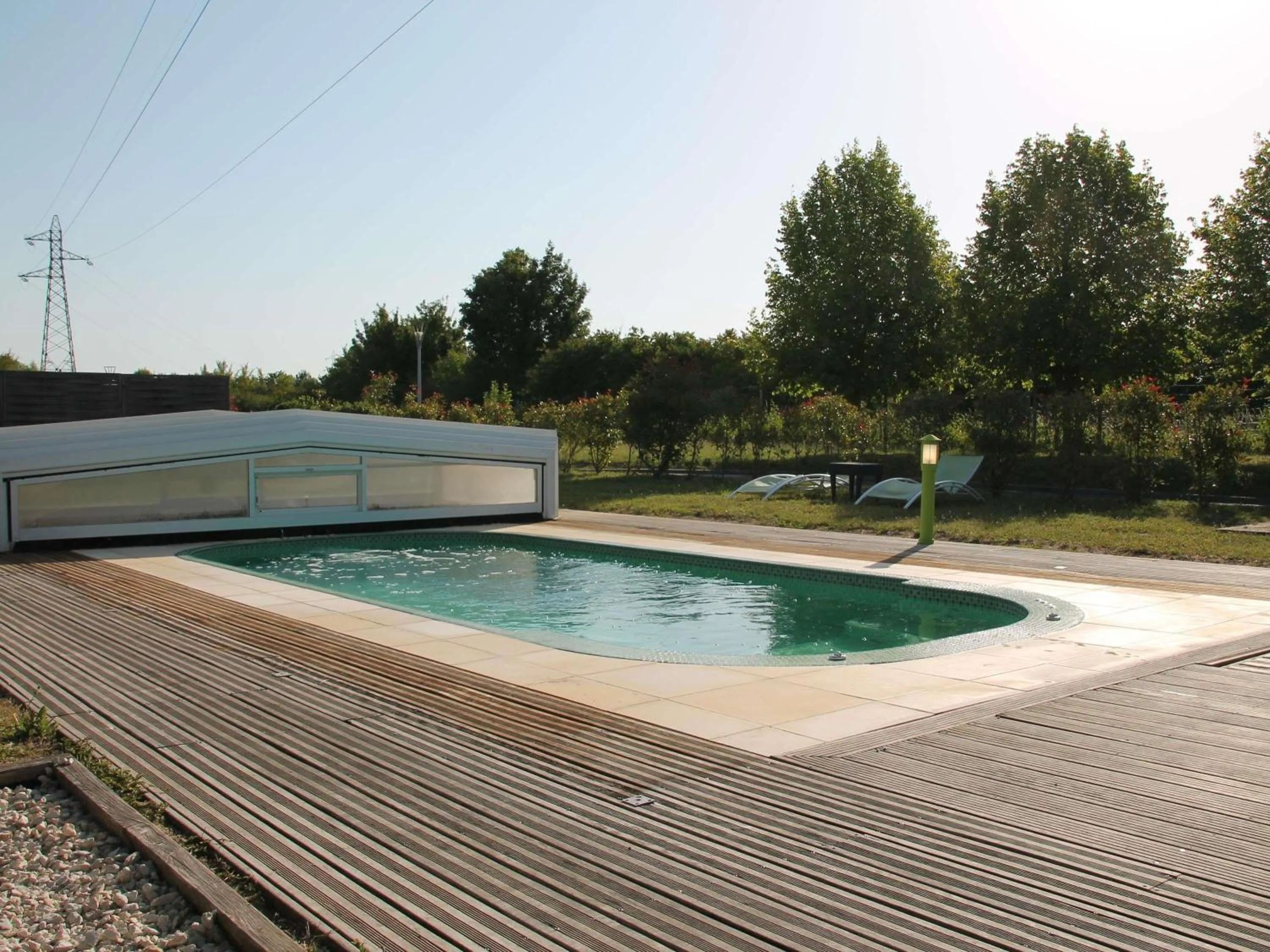 Pool view in Hôtel ibis Styles Montargis Arboria