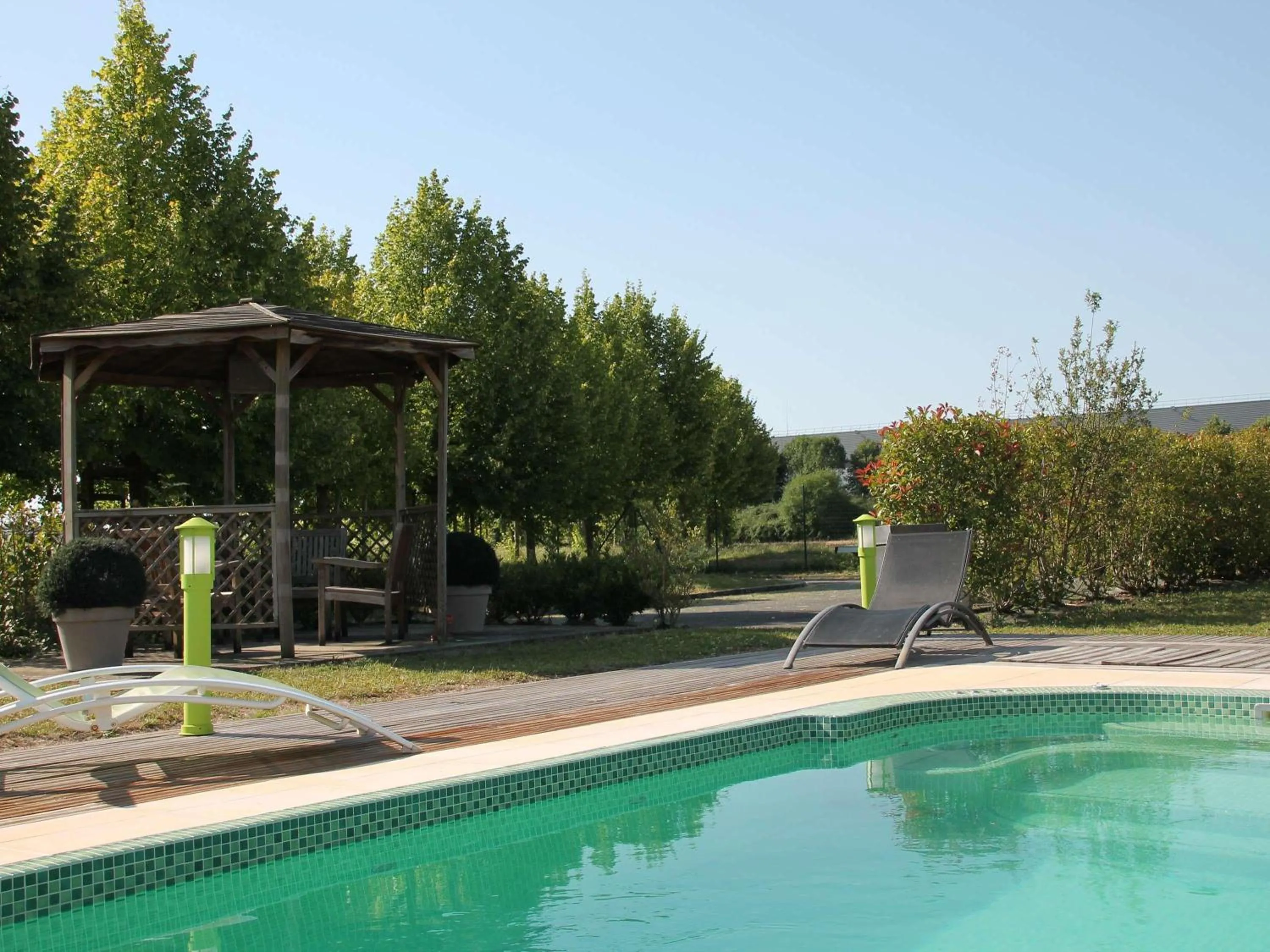 Pool view in Hôtel ibis Styles Montargis Arboria