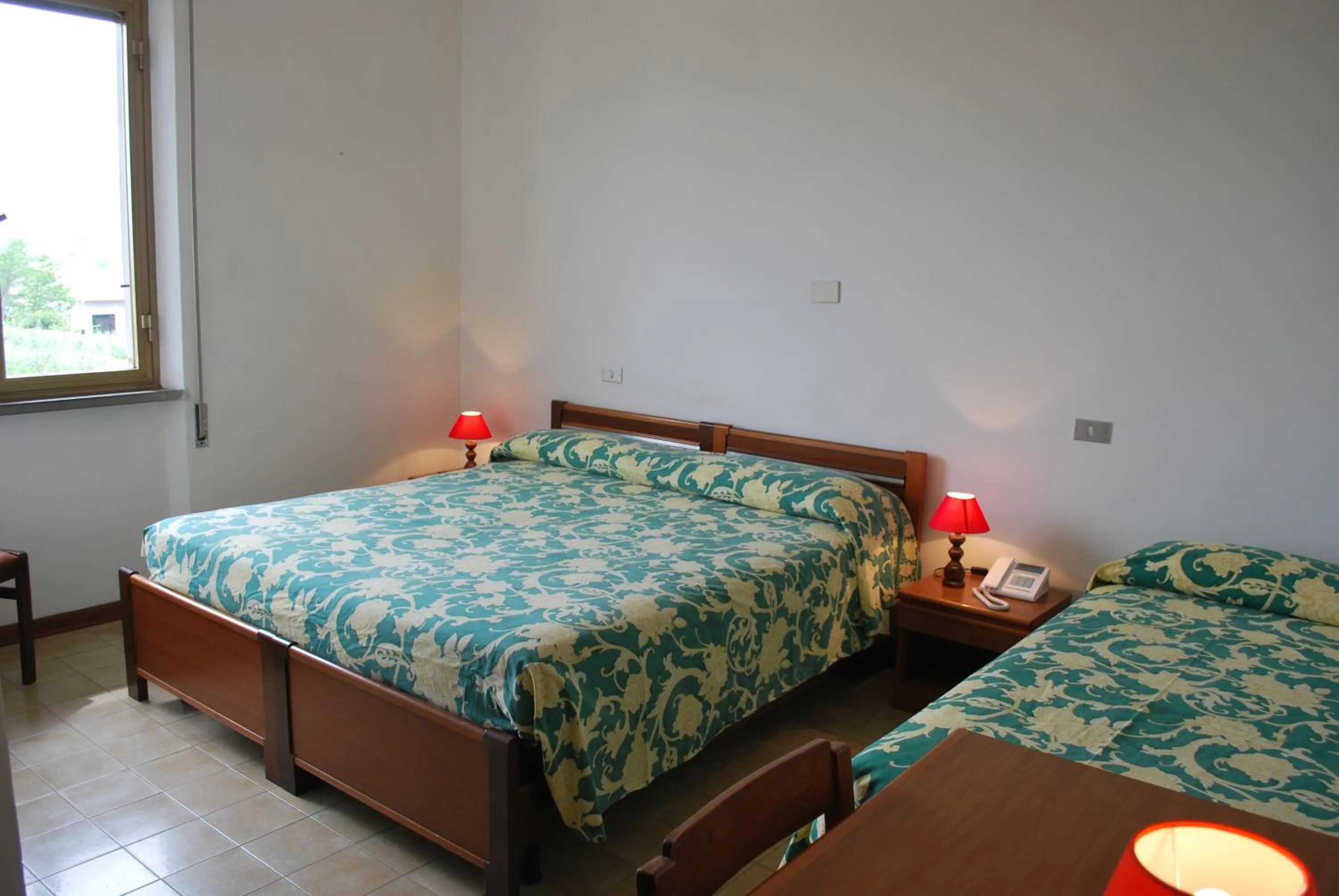 Bed in Albergo Smeraldo