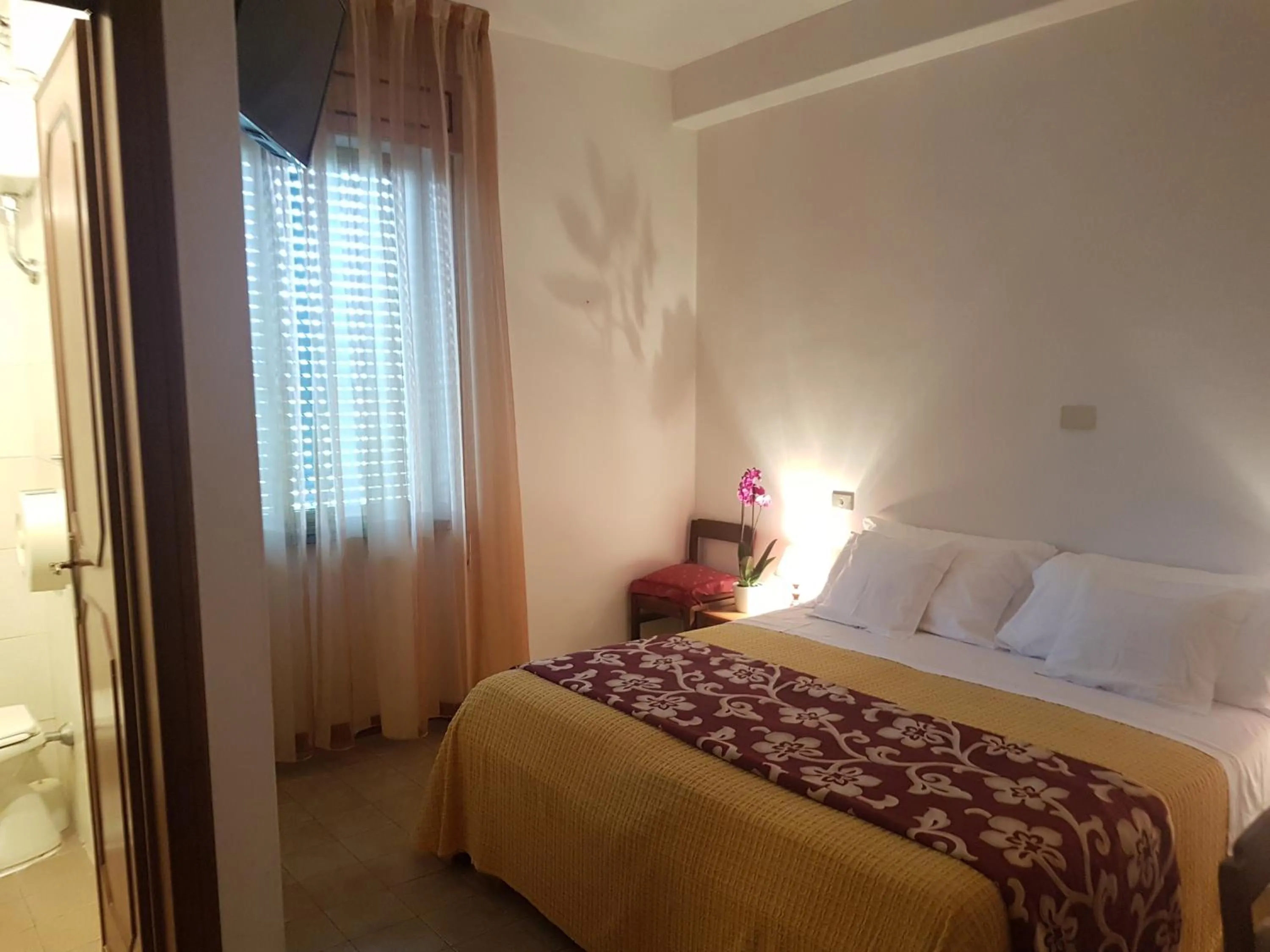 Bed in Albergo Smeraldo