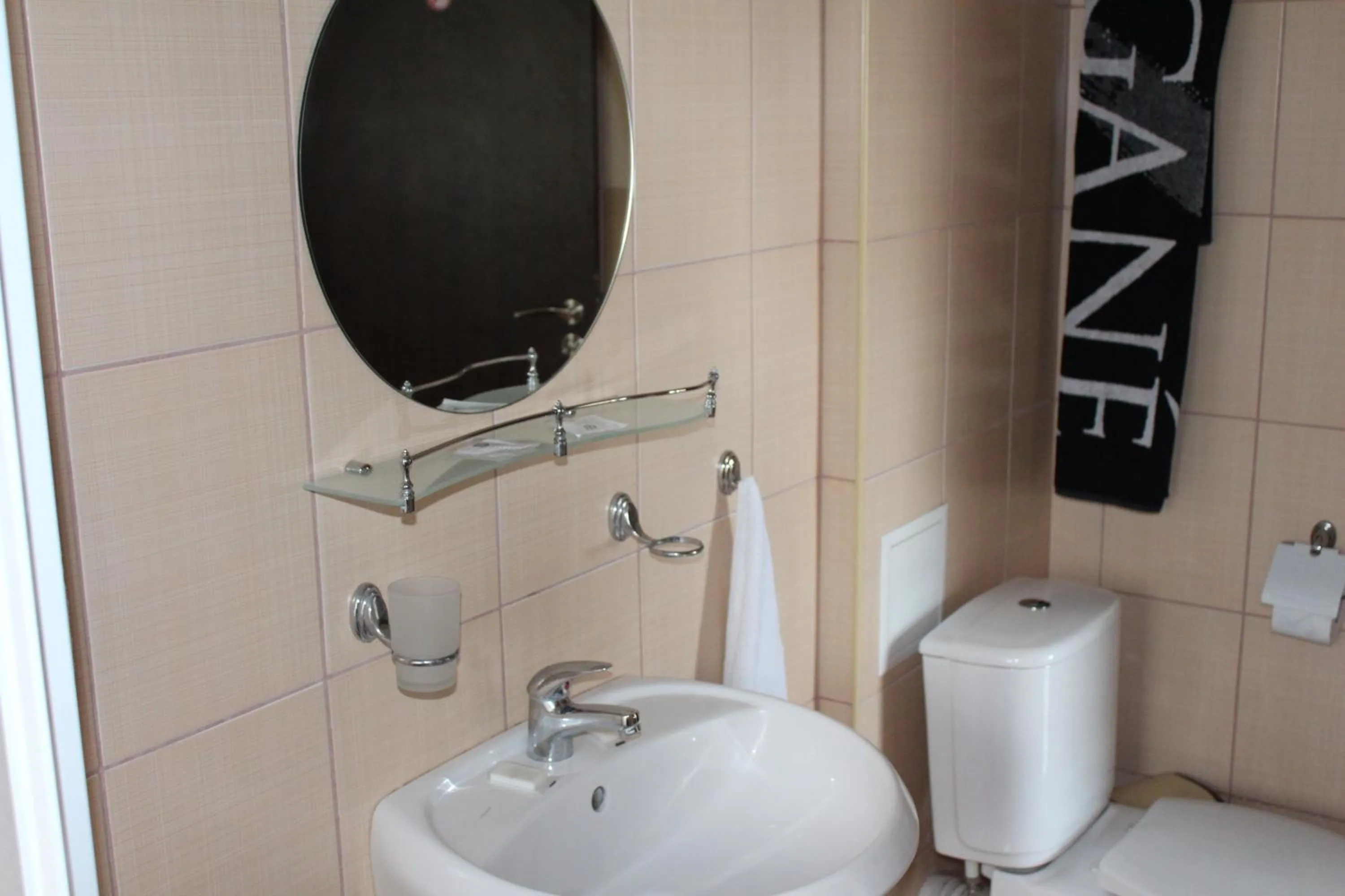 Bathroom in Family Hotel Piter