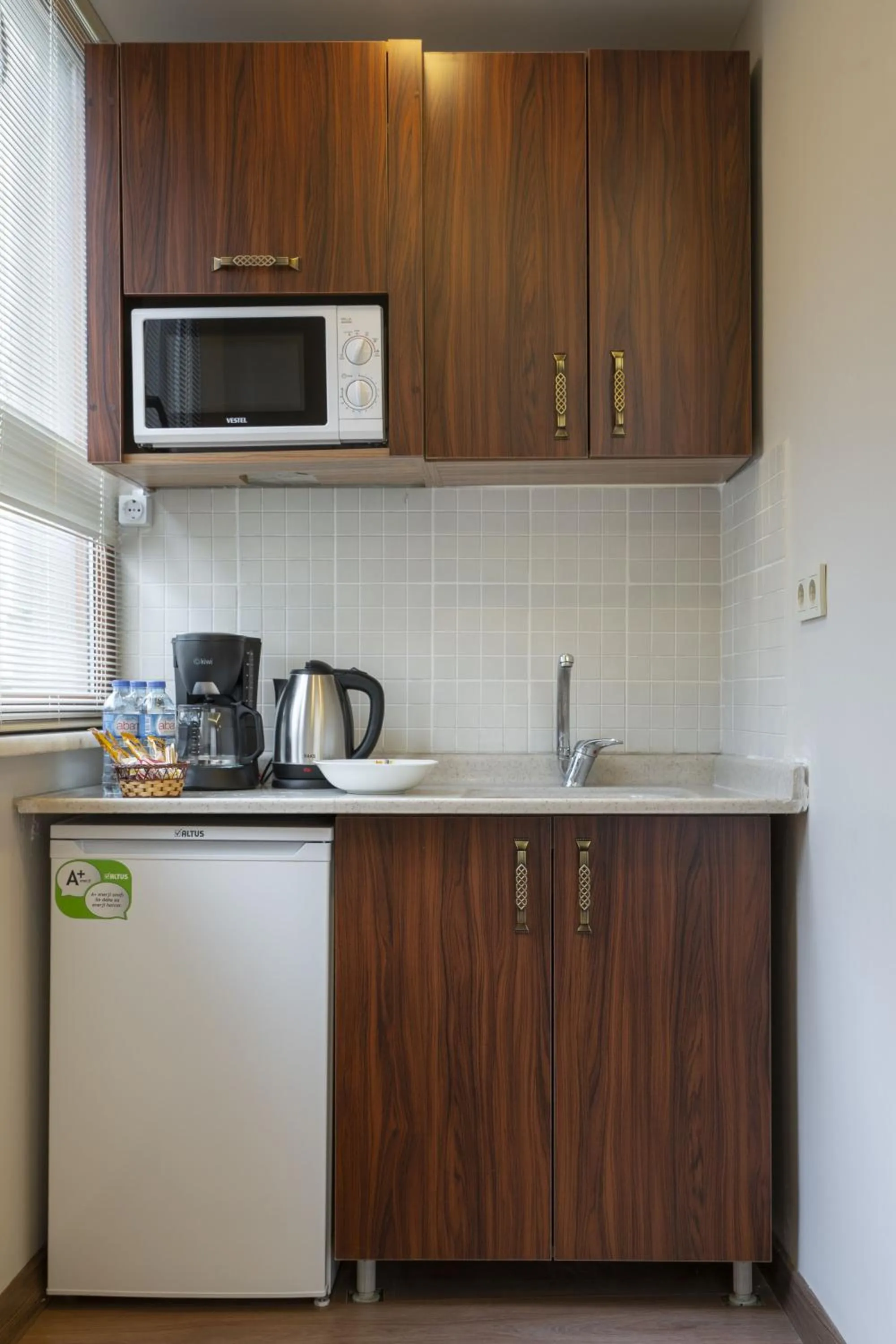 Kitchen or kitchenette in Capricorn by Otantik Suites